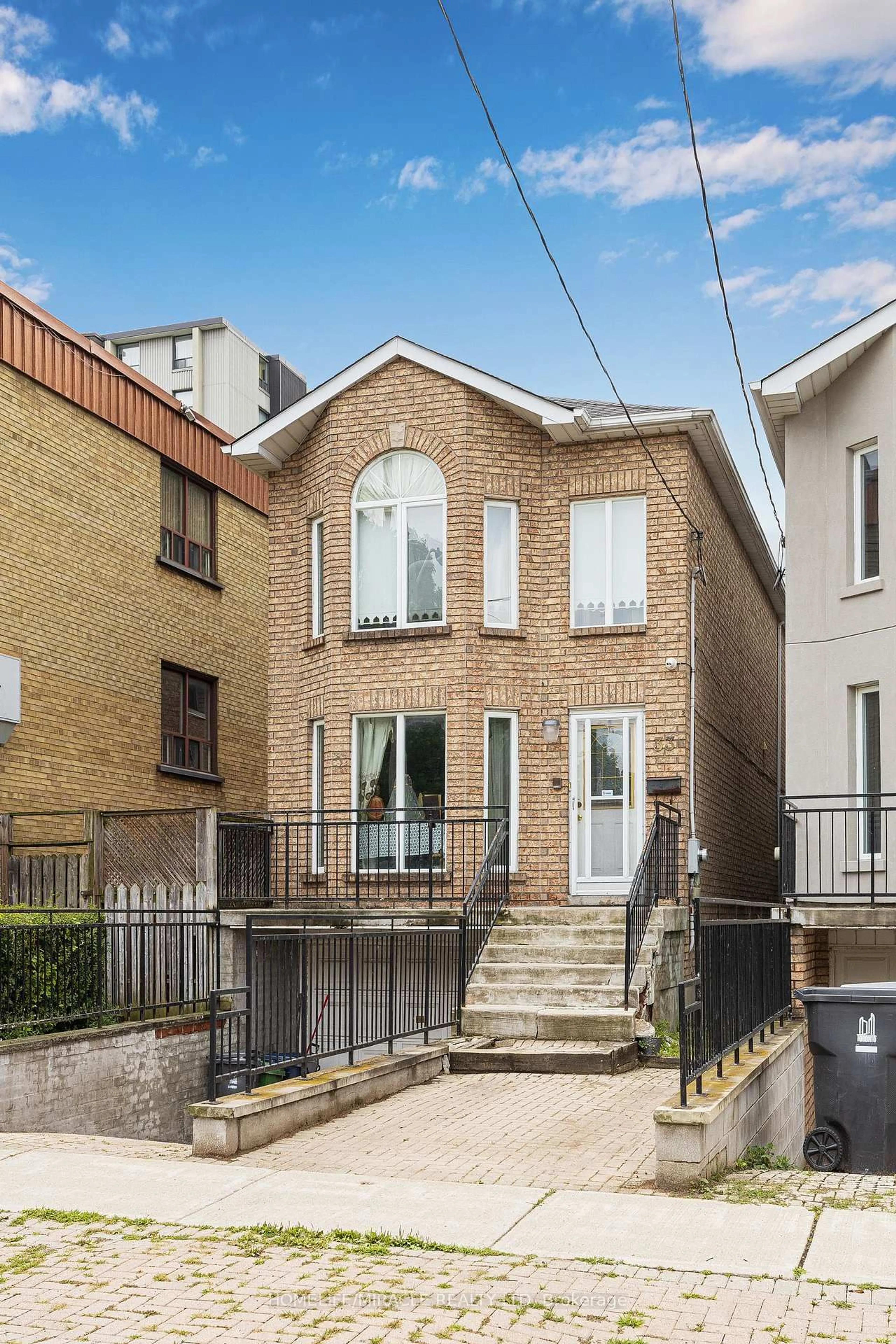 Home with brick exterior material, street for 33 Torrens Ave, Toronto Ontario M4K 2H9