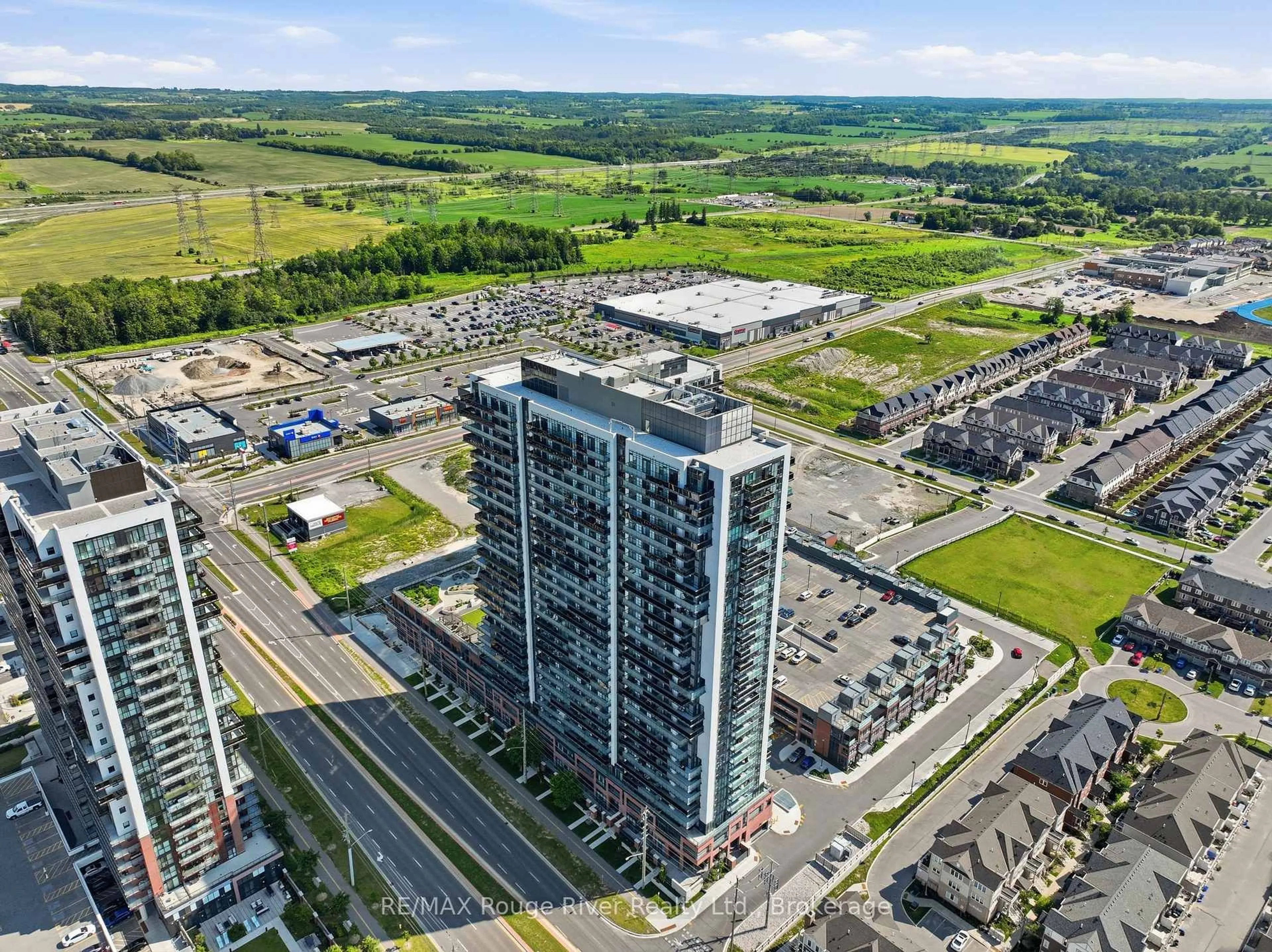 A pic from outside/outdoor area/front of a property/back of a property/a pic from drone, unknown for 2545 SIMCOE St #2321, Oshawa Ontario L1L 0W3
