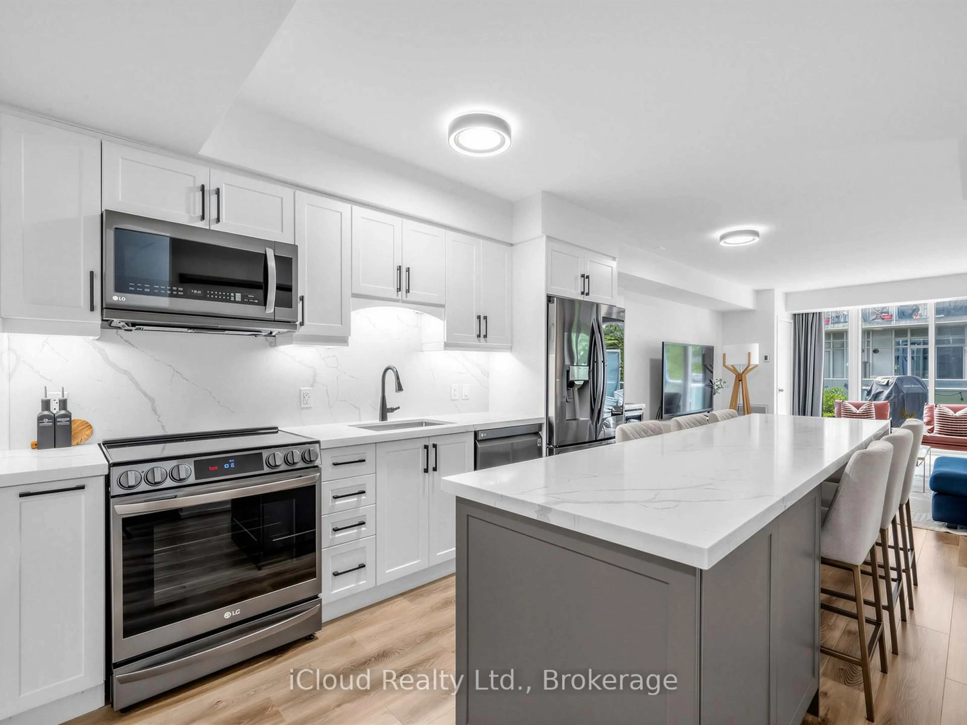 Open concept kitchen, ceramic/tile floor for 201 Carlaw Ave #244, Toronto Ontario M4M 2S1