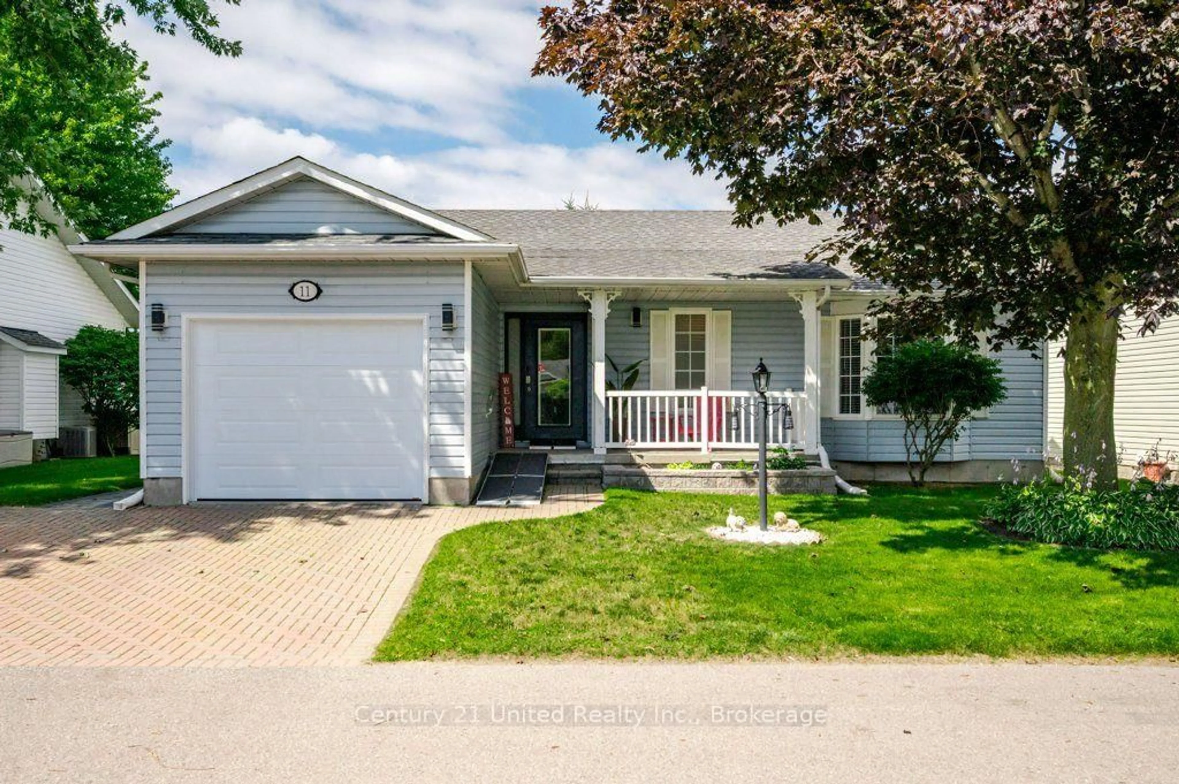 Home with vinyl exterior material, street for 11 Algonquin Tr, Clarington Ontario L1B 1A1