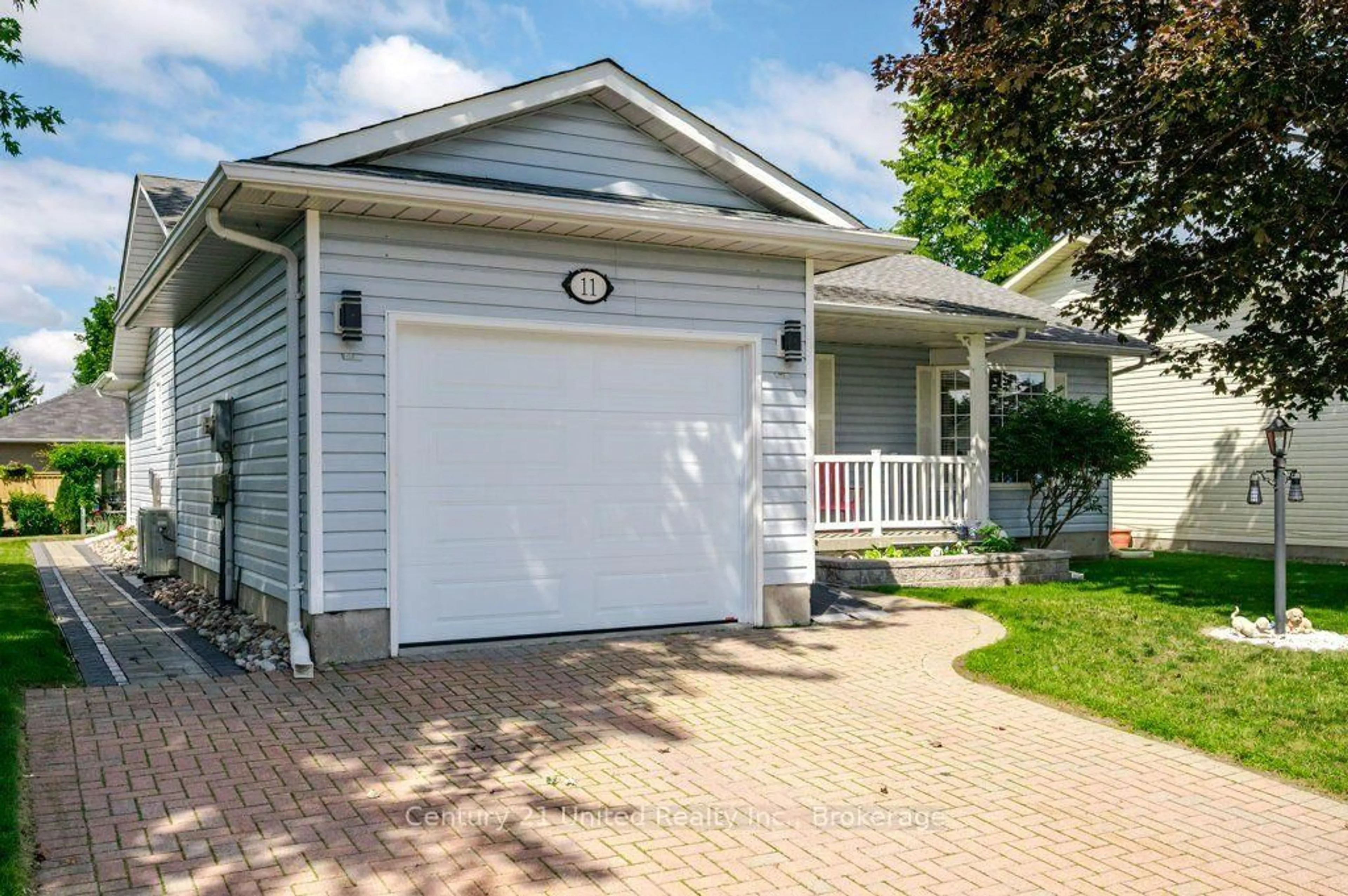 Home with vinyl exterior material, street for 11 Algonquin Tr, Clarington Ontario L1B 1A1