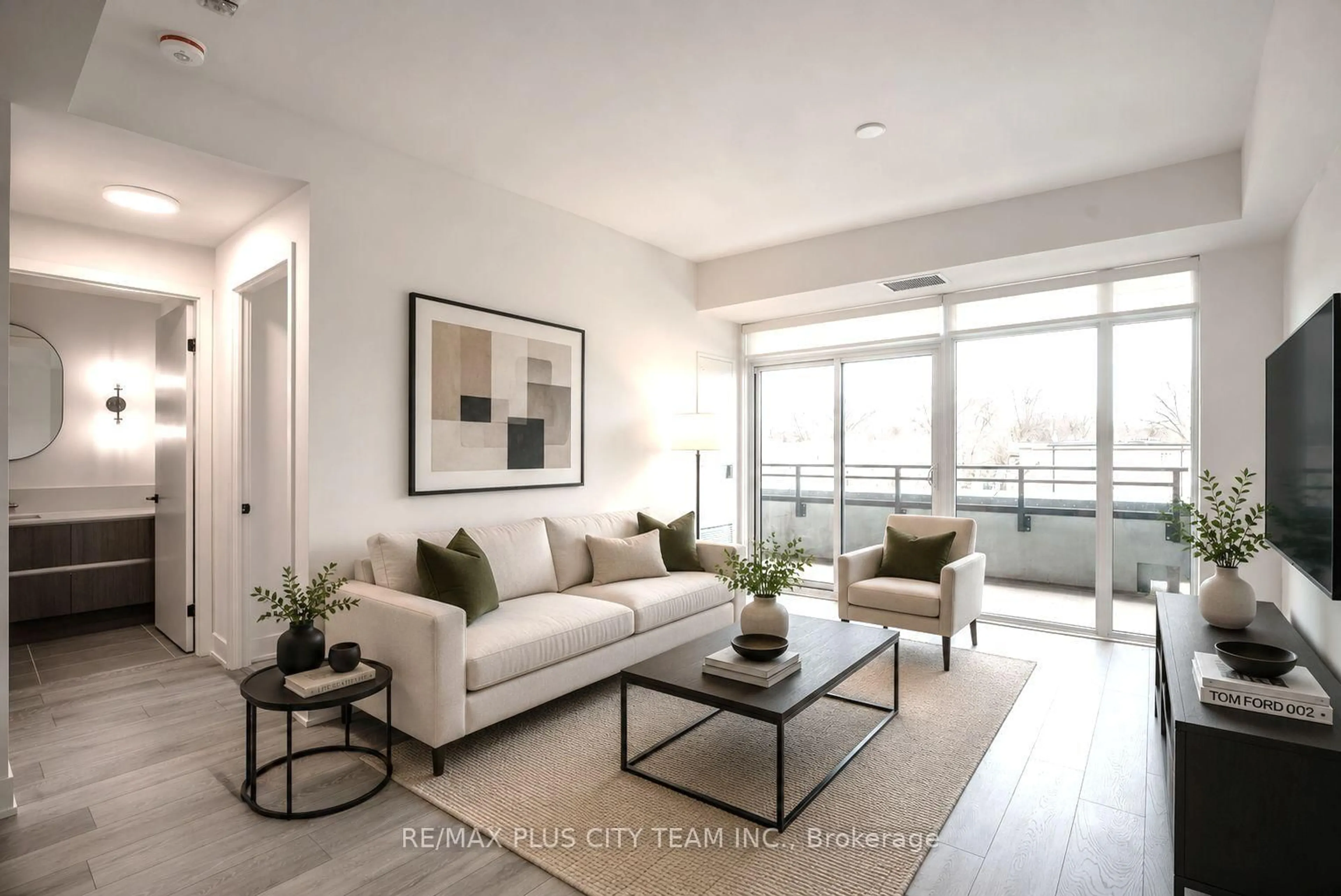 Living room with furniture, unknown for 1285 Queen St #303, Toronto Ontario M4L 0B6