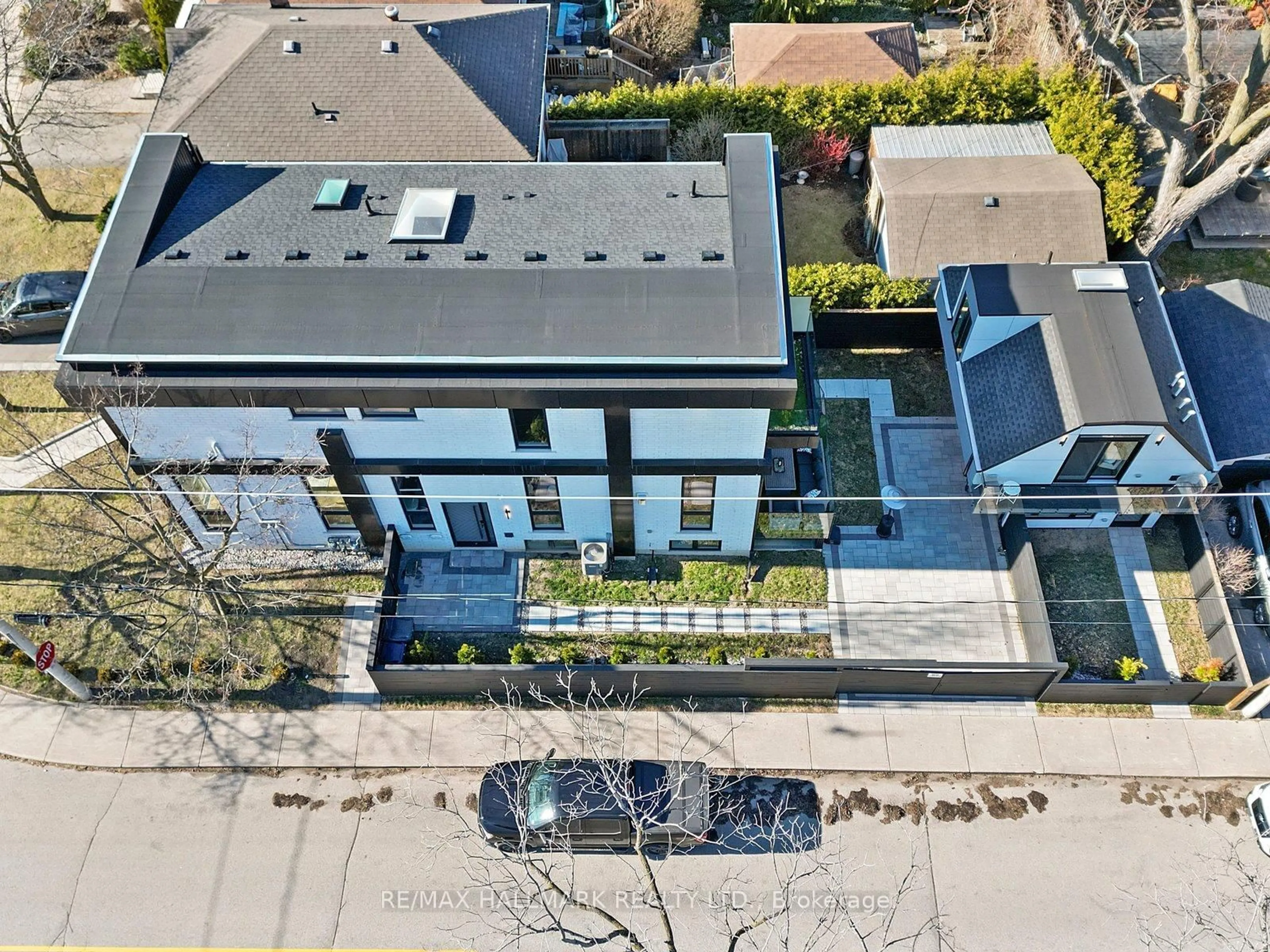 A pic from outside/outdoor area/front of a property/back of a property/a pic from drone, street for 171 Durant Ave, Toronto Ontario M4J 4W5