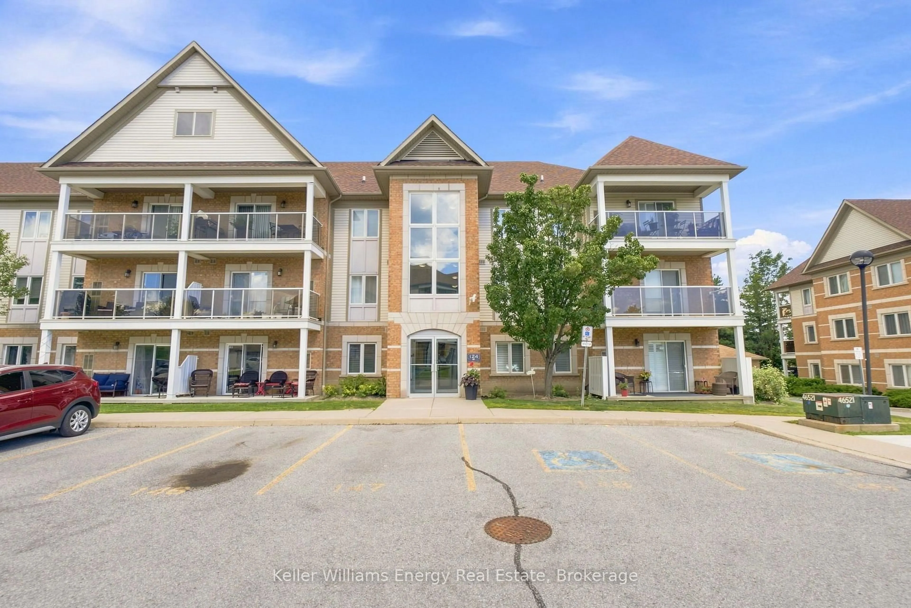 A pic from outside/outdoor area/front of a property/back of a property/a pic from drone, unknown for 124 Aspen Springs Dr #204, Clarington Ontario L1C 0G8