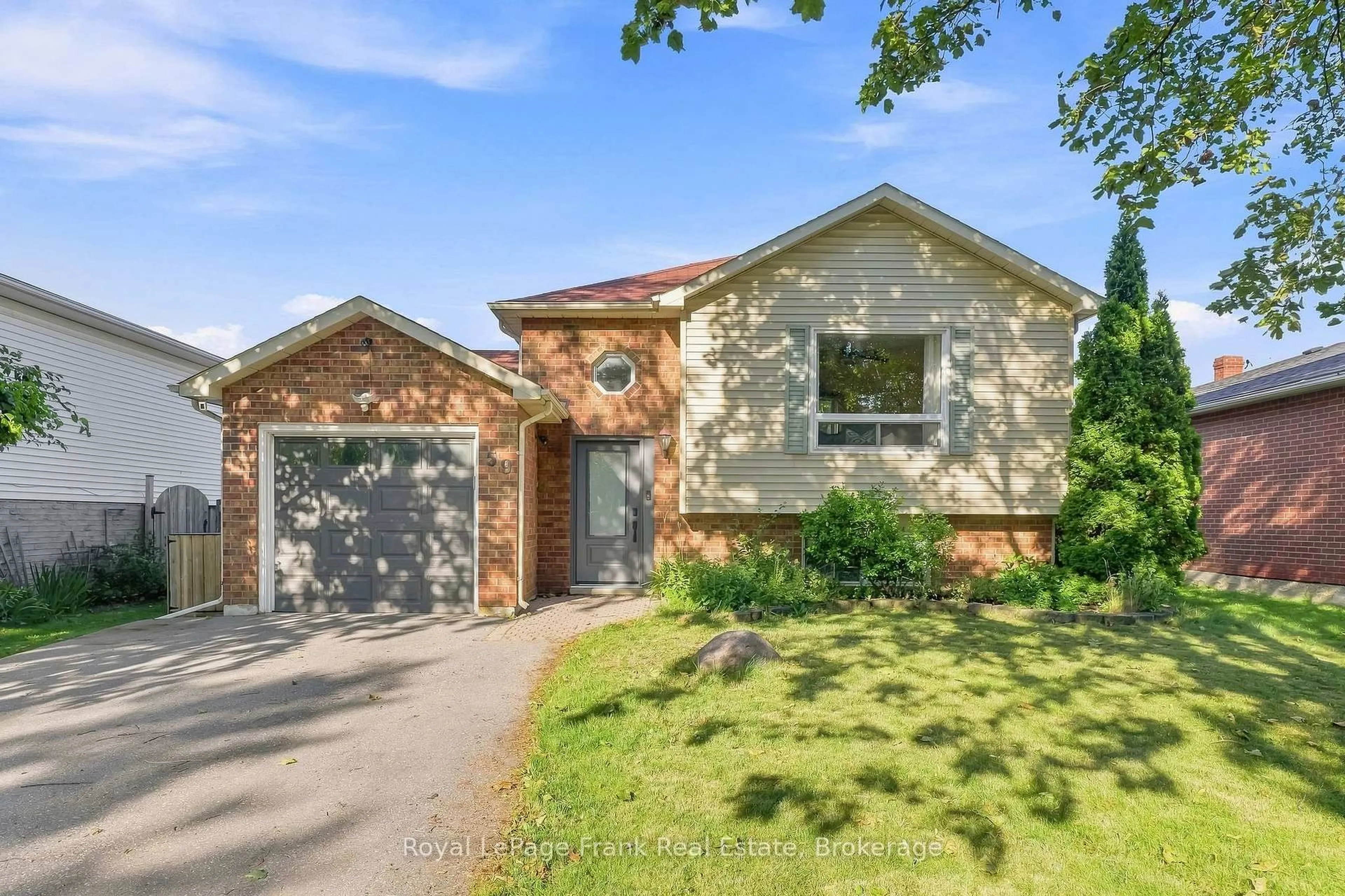 Home with brick exterior material, street for 59 Centerfield Dr, Clarington Ontario L1E 1K2