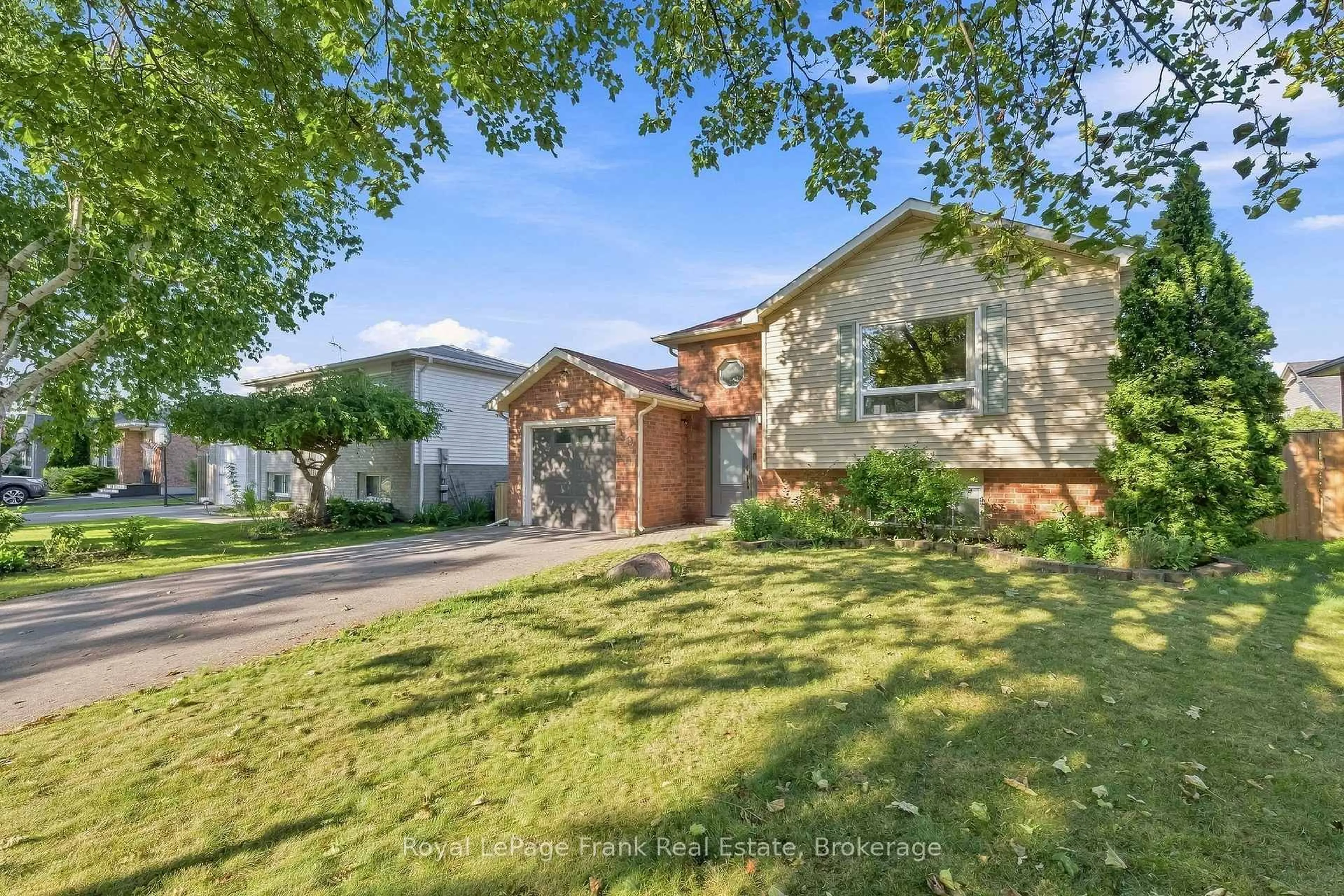 Home with brick exterior material, street for 59 Centerfield Dr, Clarington Ontario L1E 1K2