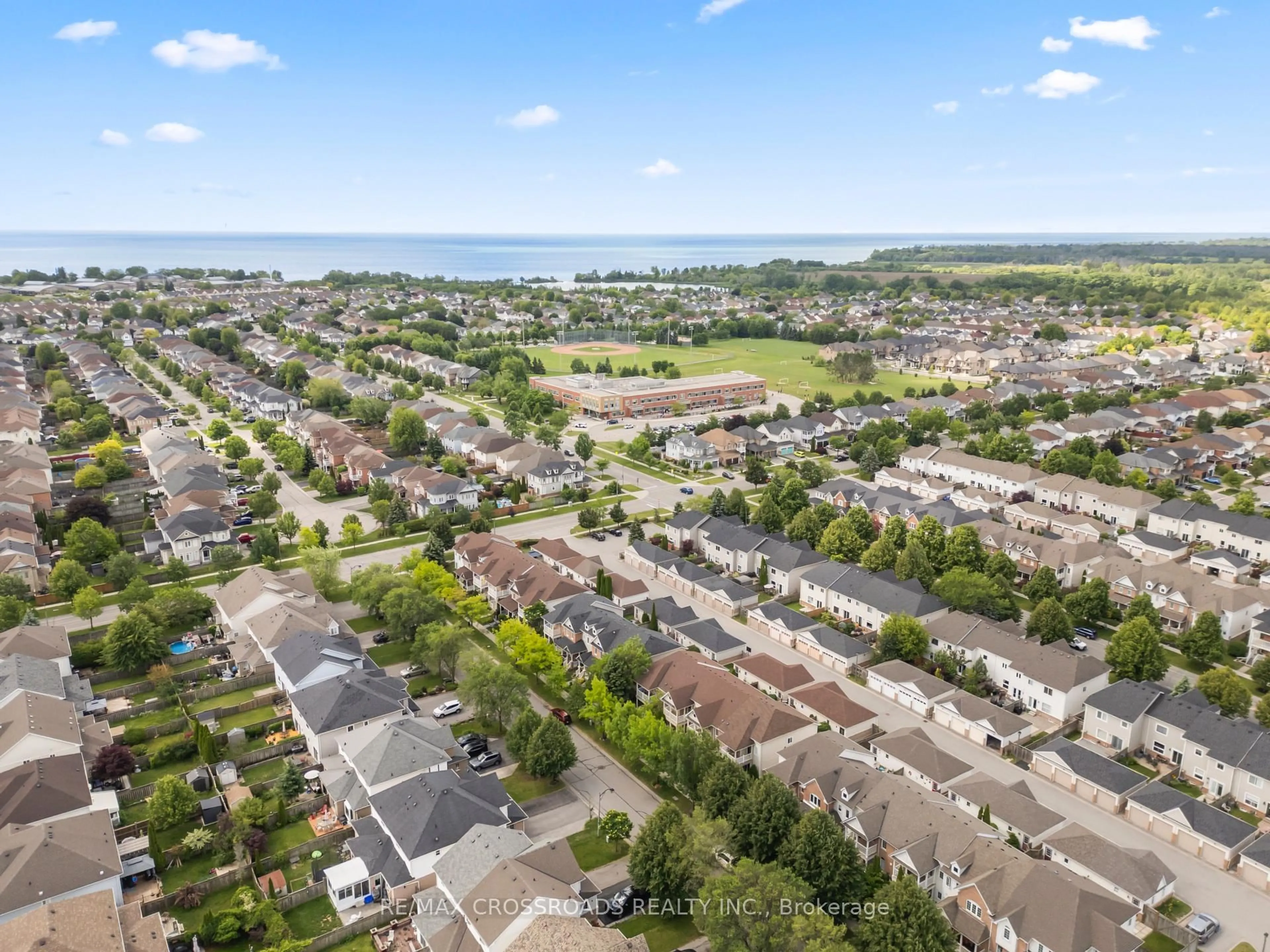 A pic from outside/outdoor area/front of a property/back of a property/a pic from drone, water/lake/river/ocean view for 67 Regatta Cres, Whitby Ontario L1N 9W5
