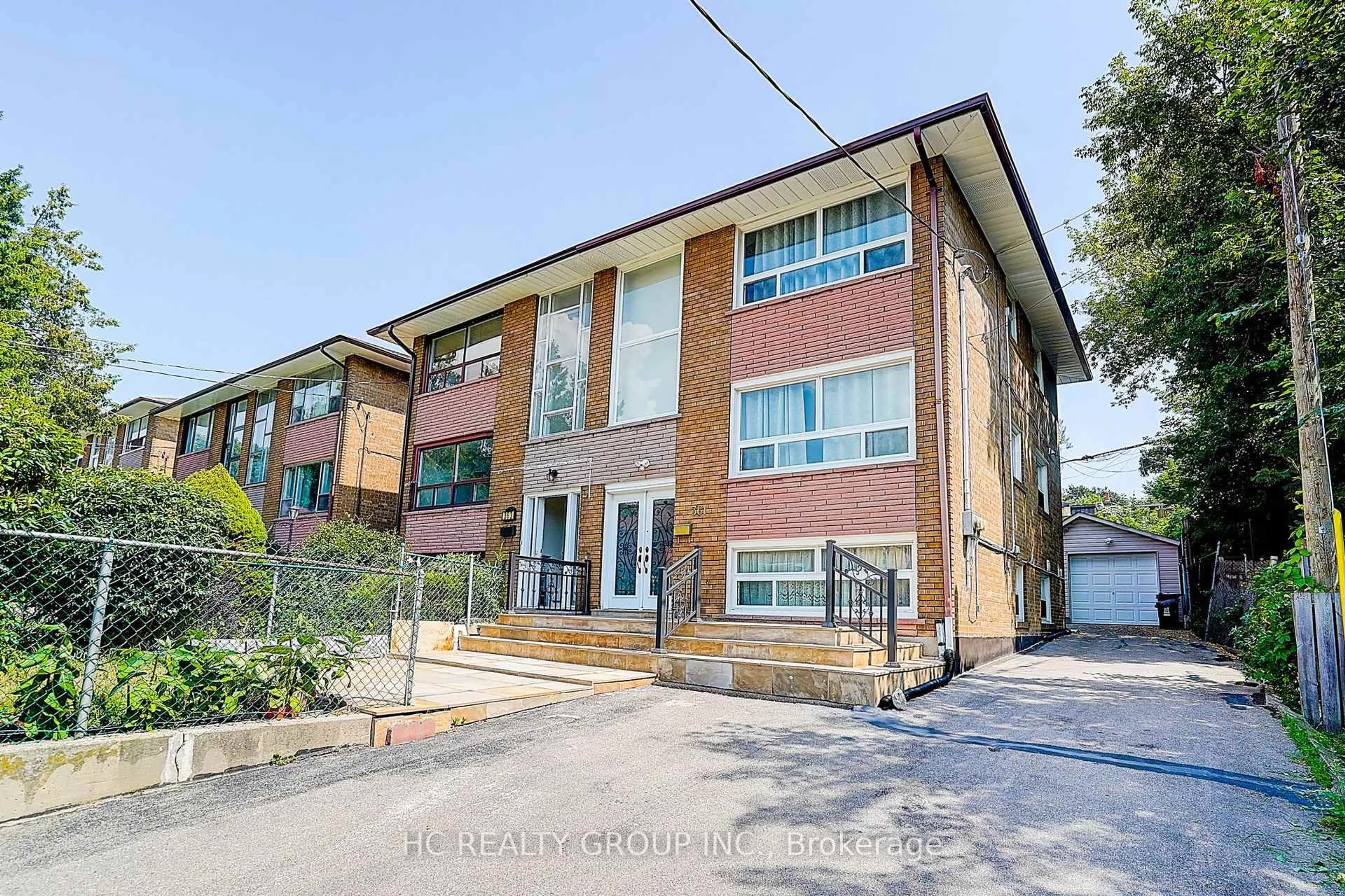 Home with brick exterior material, building for 361 Highfield Rd, Toronto Ontario M4L 2V7