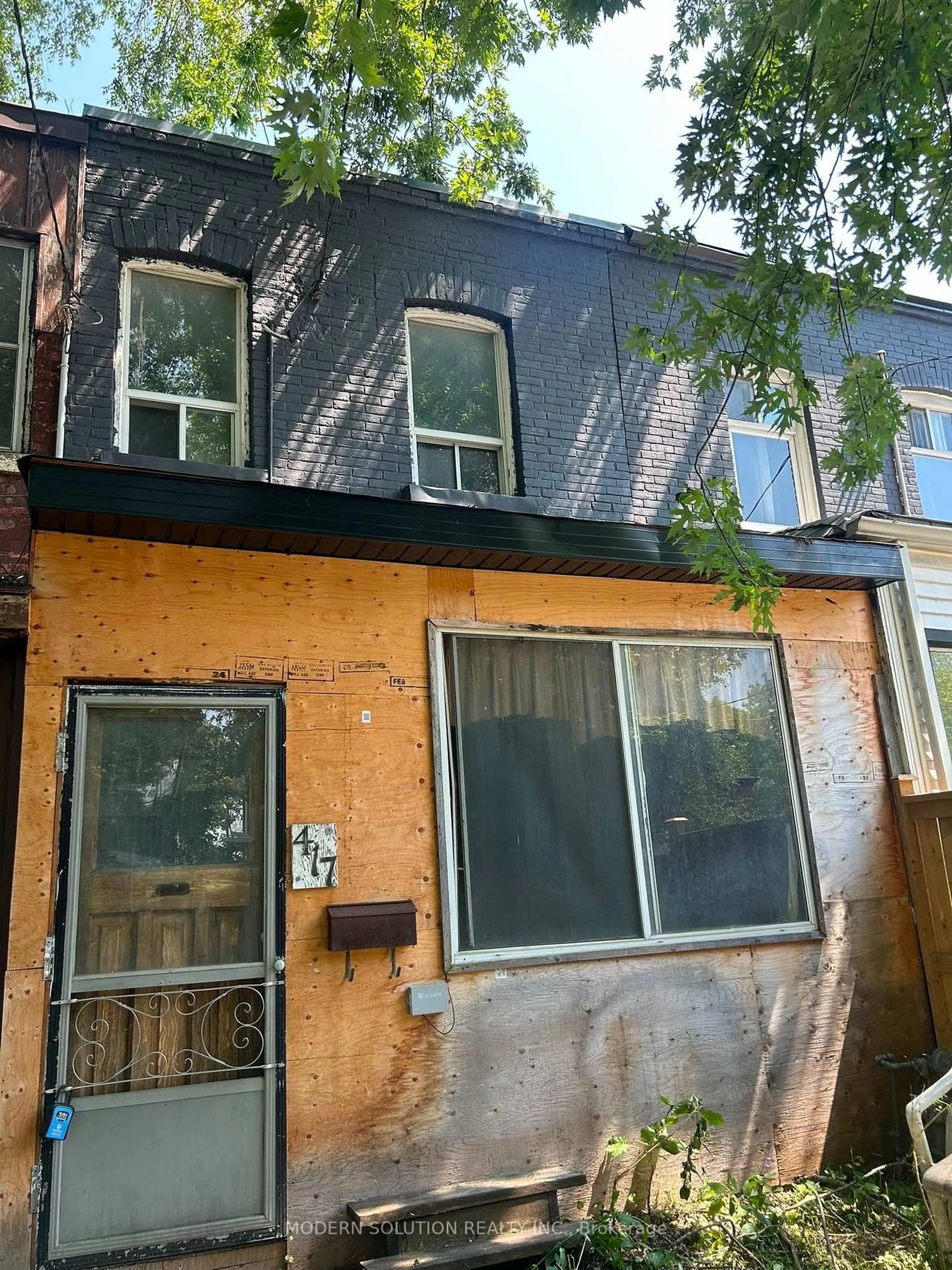 Home with brick exterior material, street for 417 Leslie St, Toronto Ontario M4M 3E3