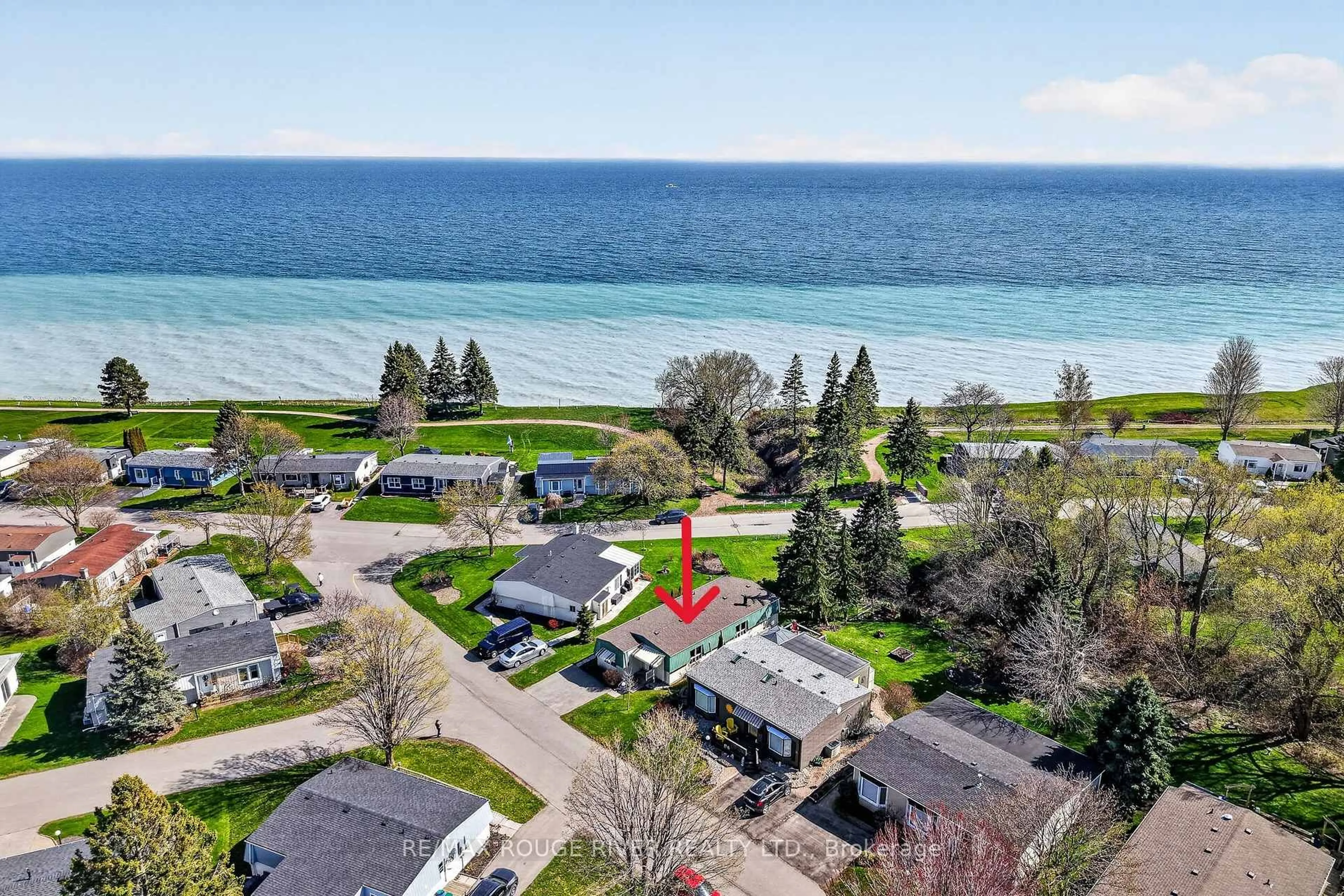 A pic from outside/outdoor area/front of a property/back of a property/a pic from drone, water/lake/river/ocean view for 22 Eastbank Rd, Clarington Ontario L1B 1A4