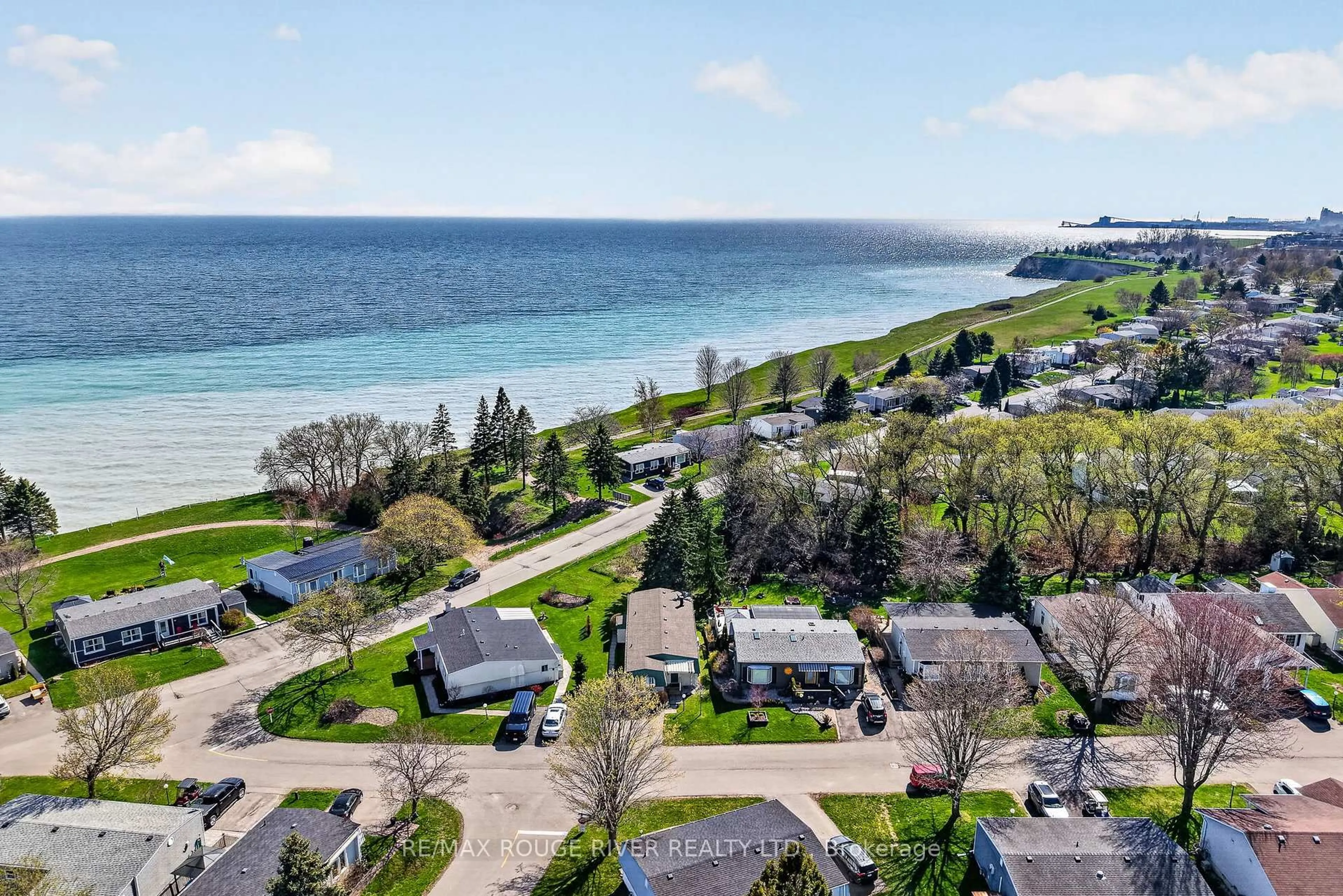 A pic from outside/outdoor area/front of a property/back of a property/a pic from drone, water/lake/river/ocean view for 22 Eastbank Rd, Clarington Ontario L1B 1A4