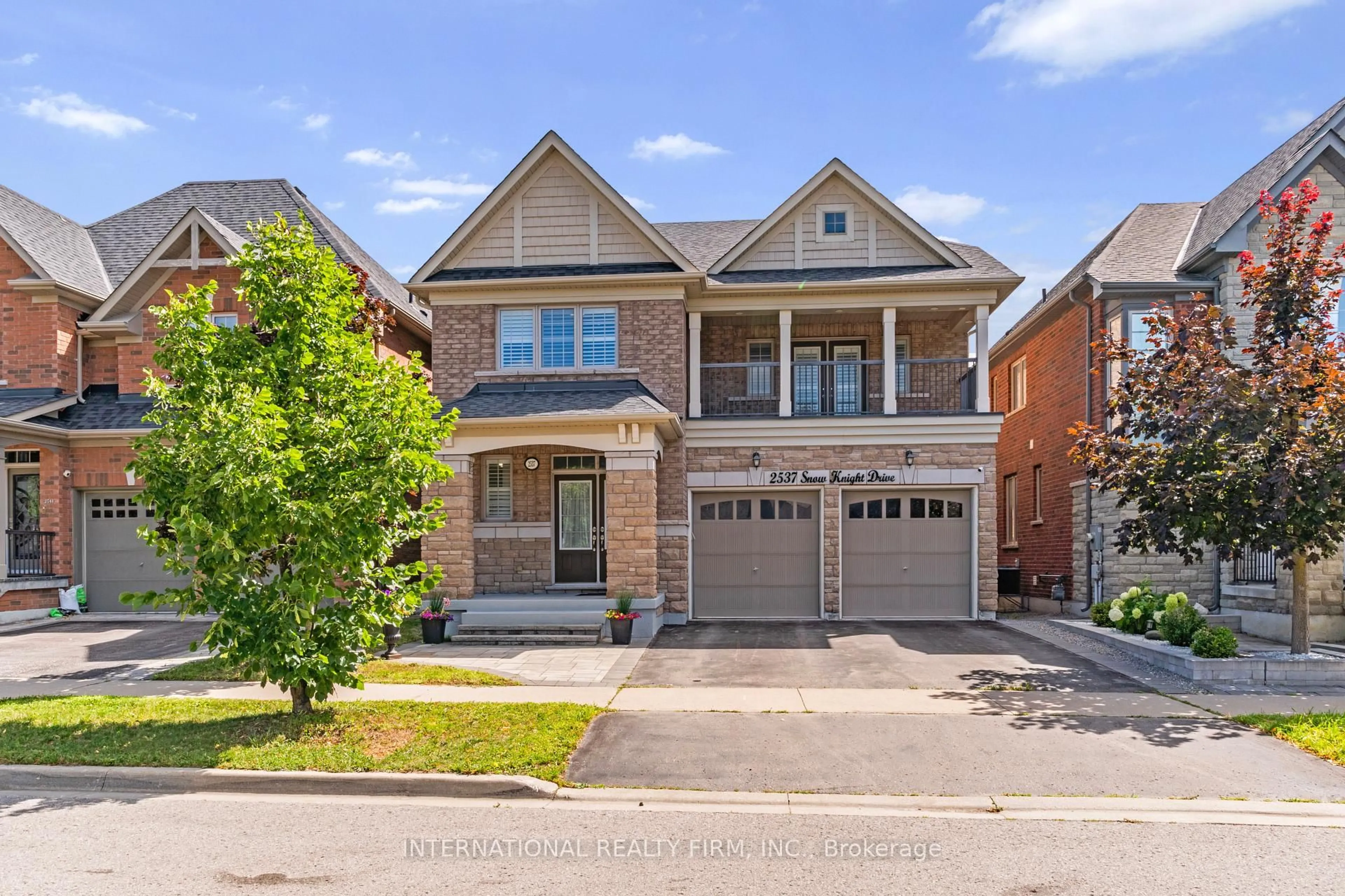 Home with brick exterior material, street for 2537 Snow Knight Dr, Oshawa Ontario L1L 0K2