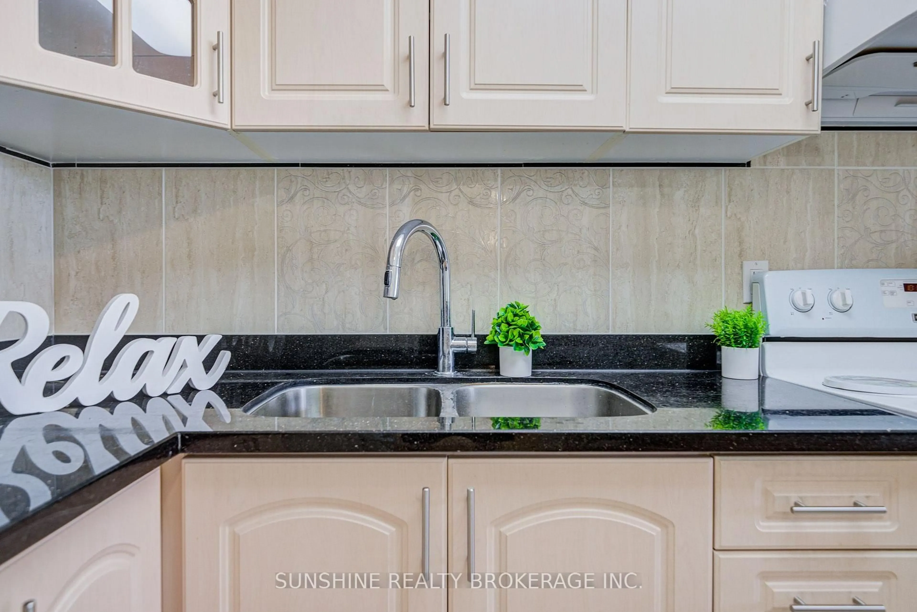 Standard kitchen, ceramic/tile floor for 2500 Bridletowne Circ #408, Toronto Ontario M1W 2V6