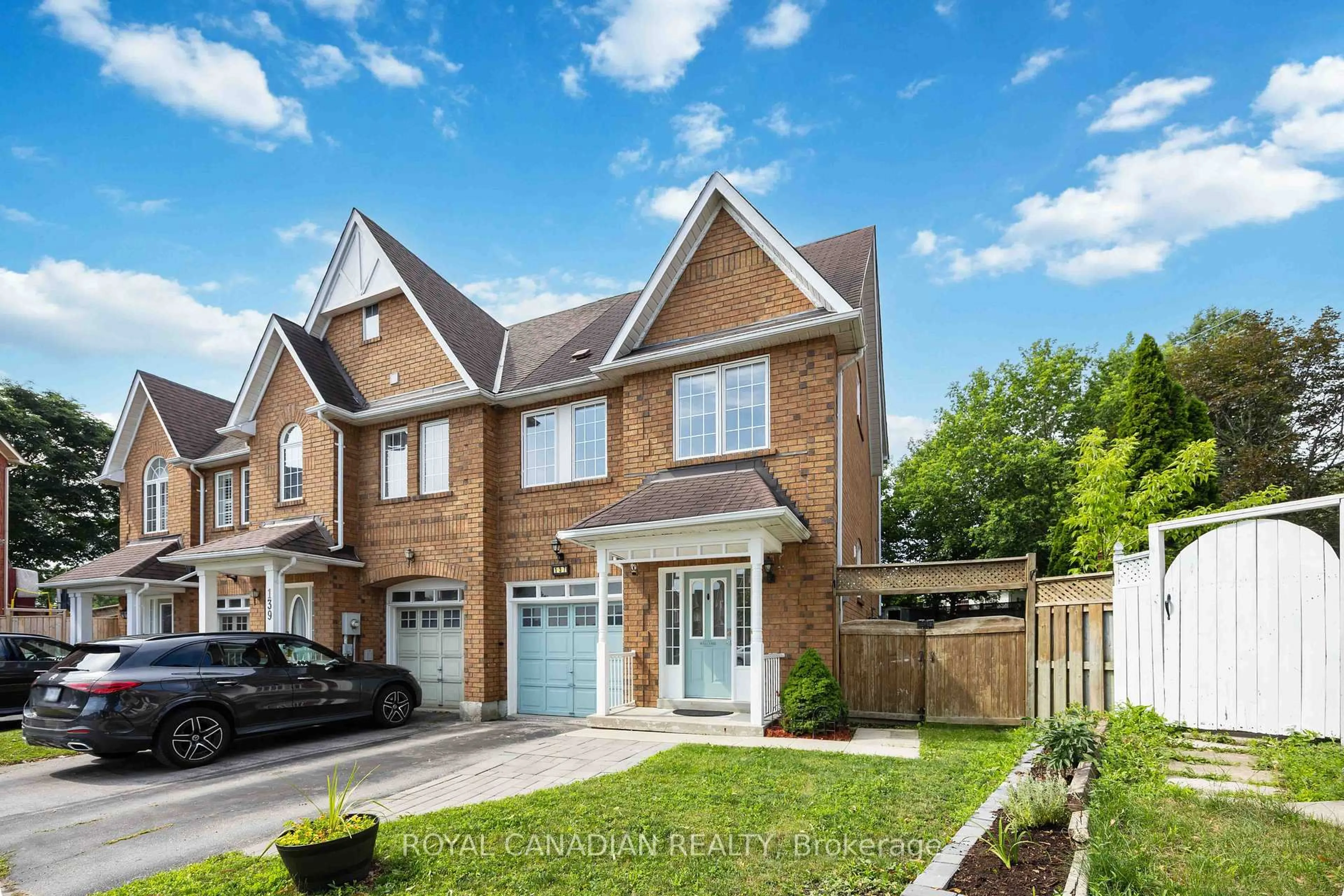 Home with brick exterior material, street for 137 Stokely Cres, Whitby Ontario L1N 9S9
