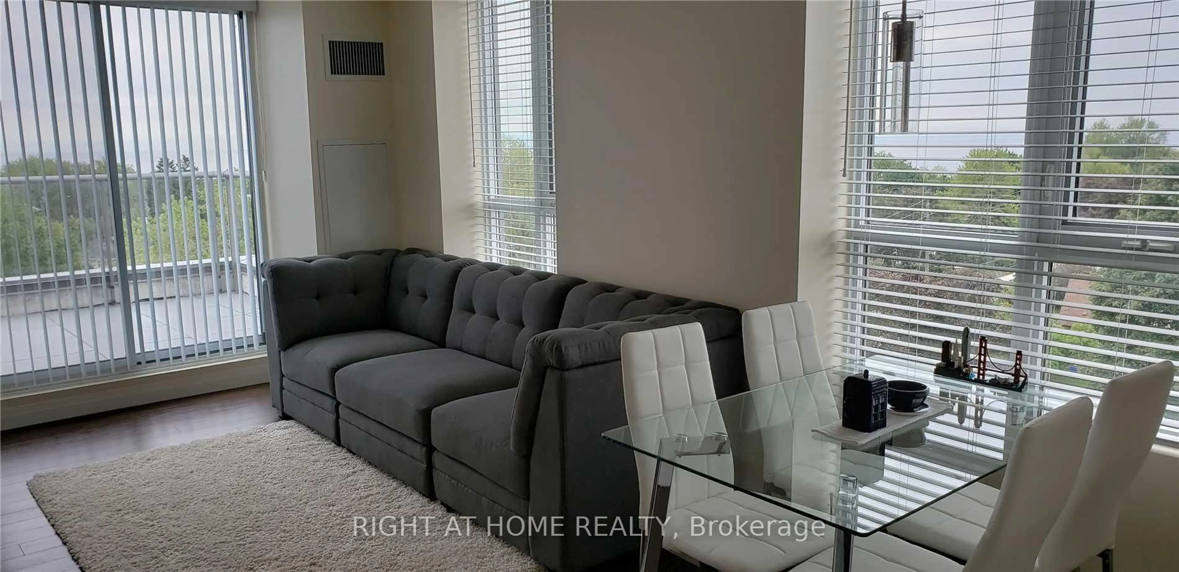 Living room with furniture, unknown for 22 East Haven Dr #718, Toronto Ontario M1N 1L9