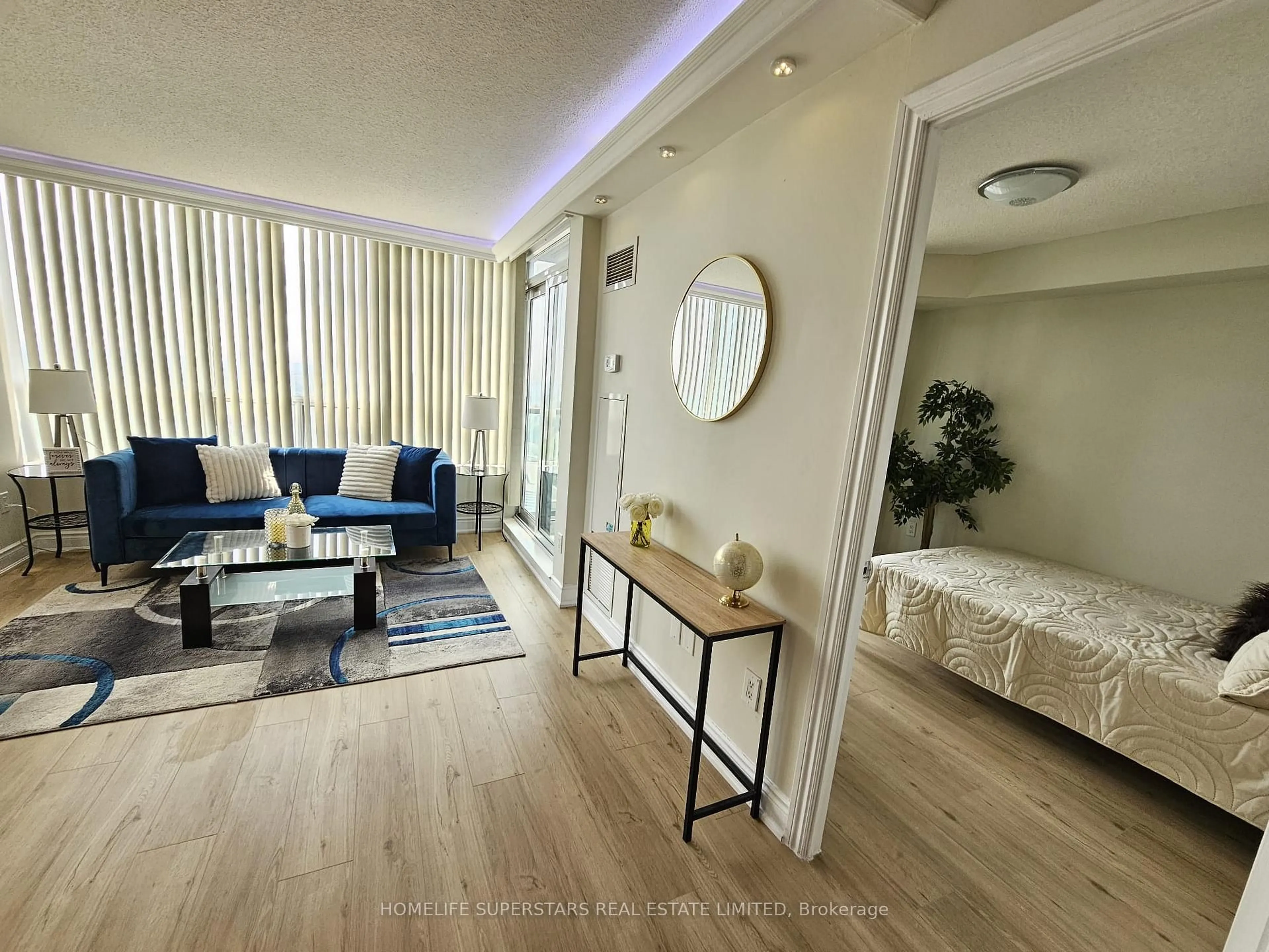Living room with furniture, wood/laminate floor for 60 Brian Harrison Way #2109, Toronto Ontario M1P 5J5