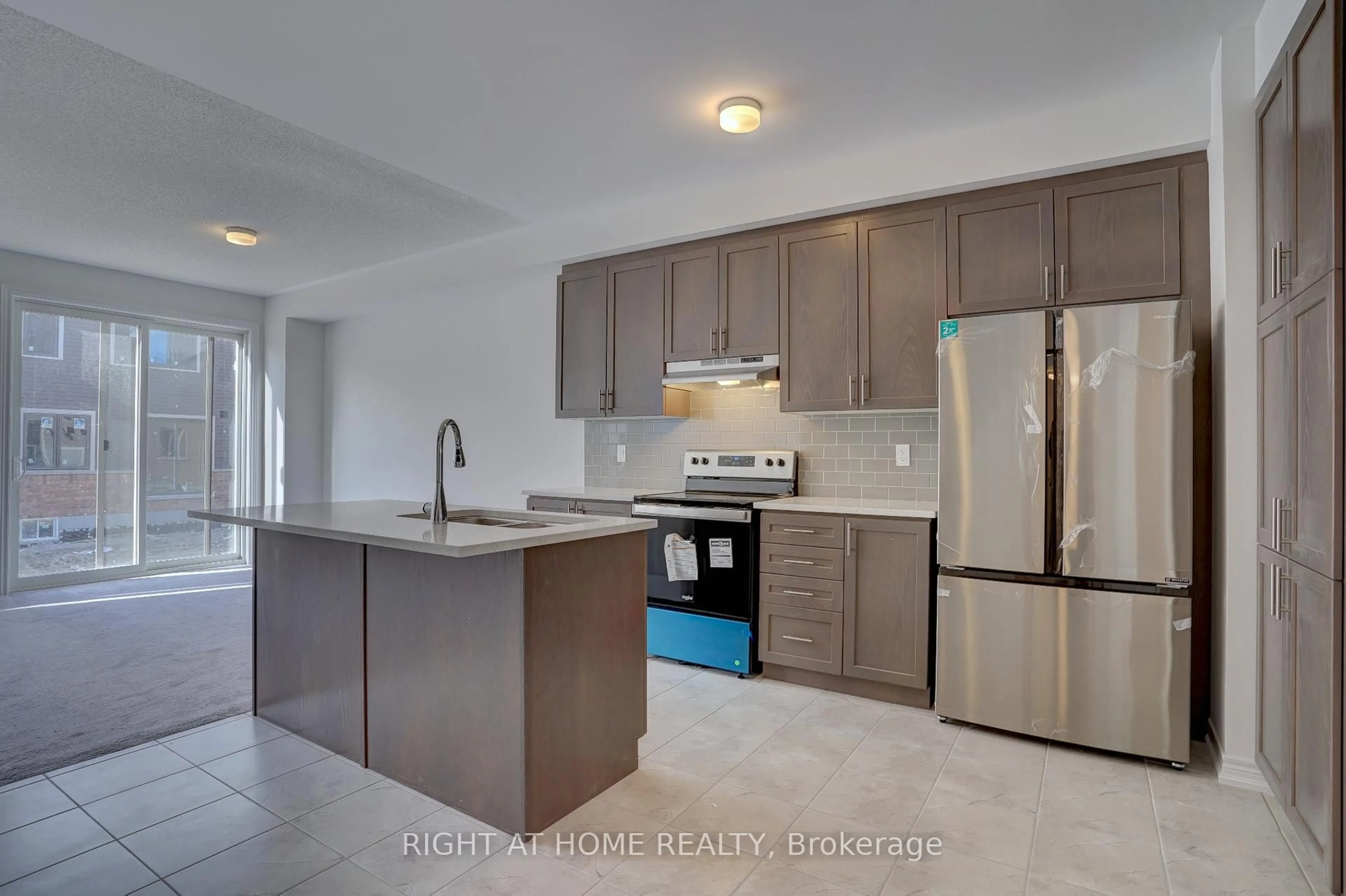 Open concept kitchen, ceramic/tile floor for 2038 CAMERON LOTT Cres, Oshawa Ontario L1L 0S1