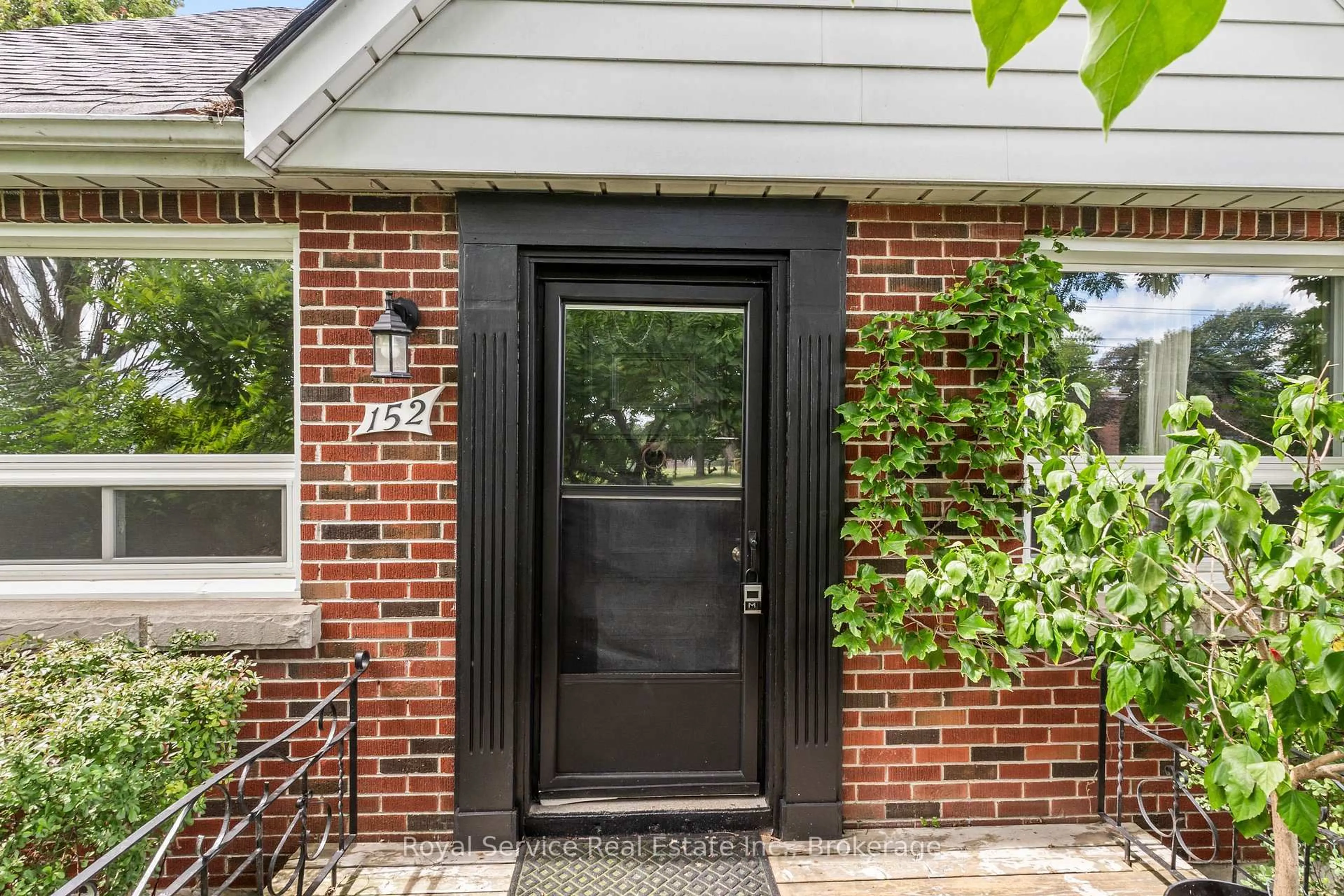 Home with brick exterior material, street for 152 Harmony Rd, Oshawa Ontario L1H 6T5