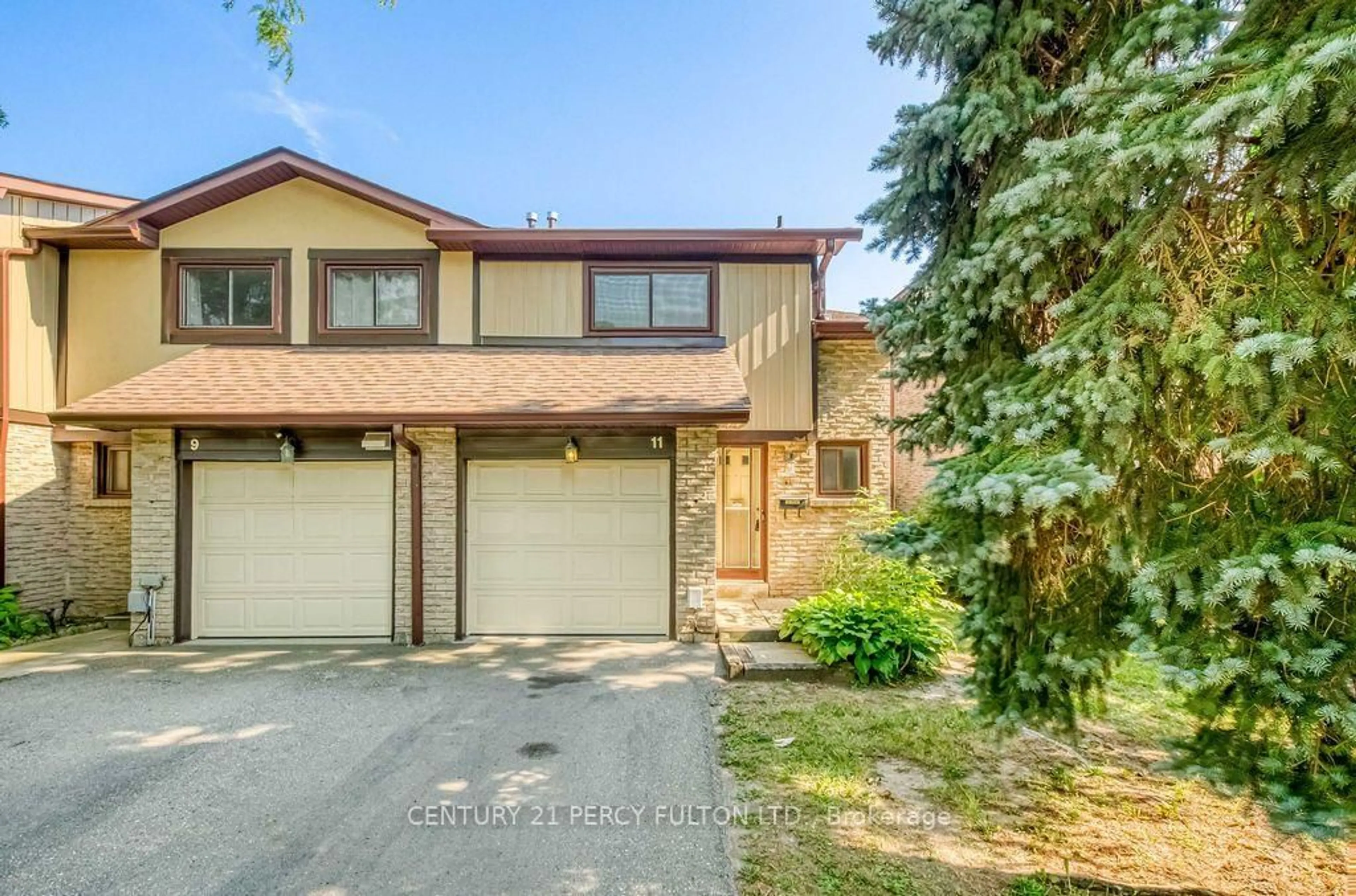 A pic from outside/outdoor area/front of a property/back of a property/a pic from drone, street for 11 Fundy Bay Blvd, Toronto Ontario M1W 3A1