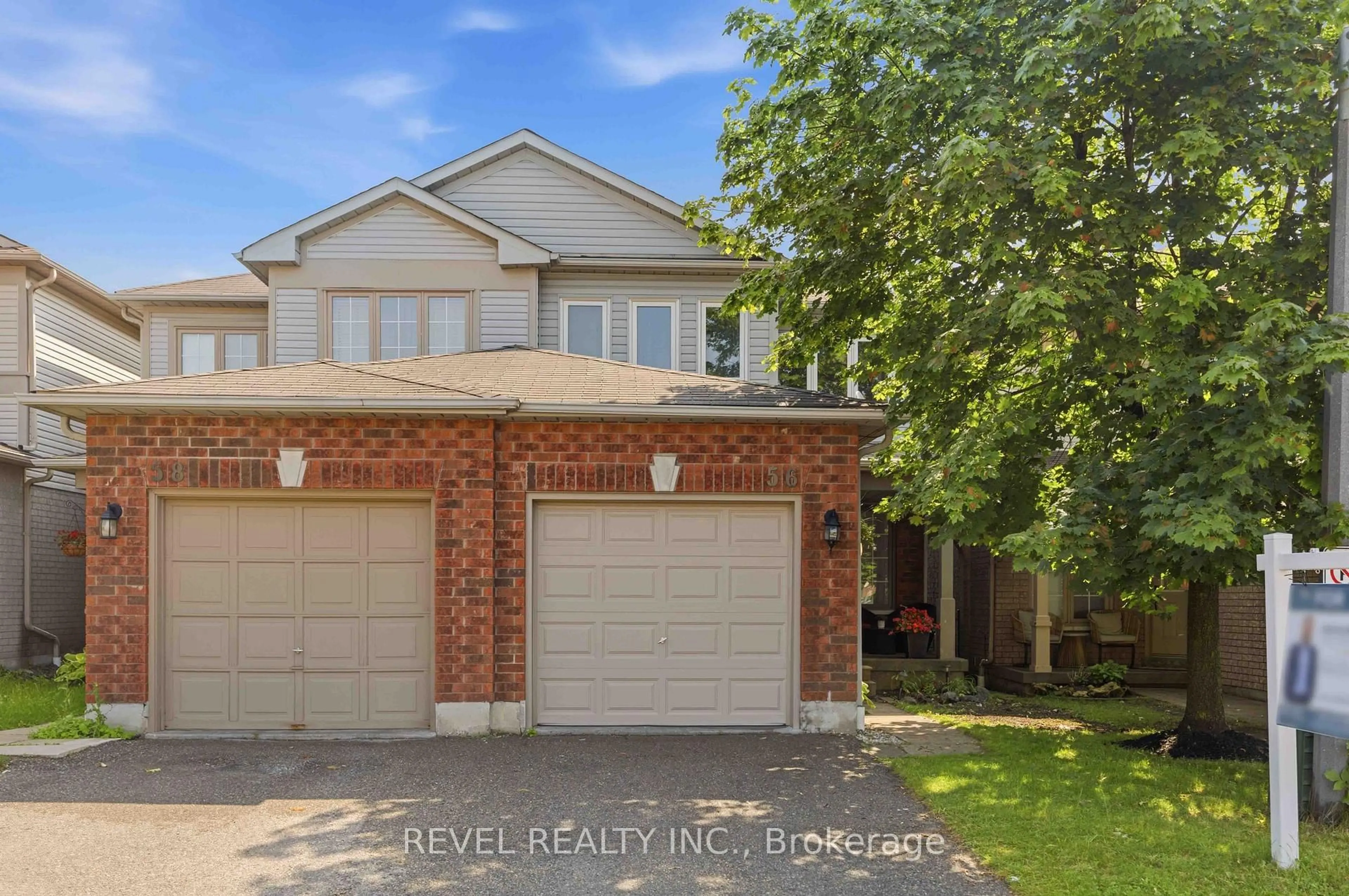 Home with brick exterior material, street for 56 Greengrove Way, Whitby Ontario L1R 2N4