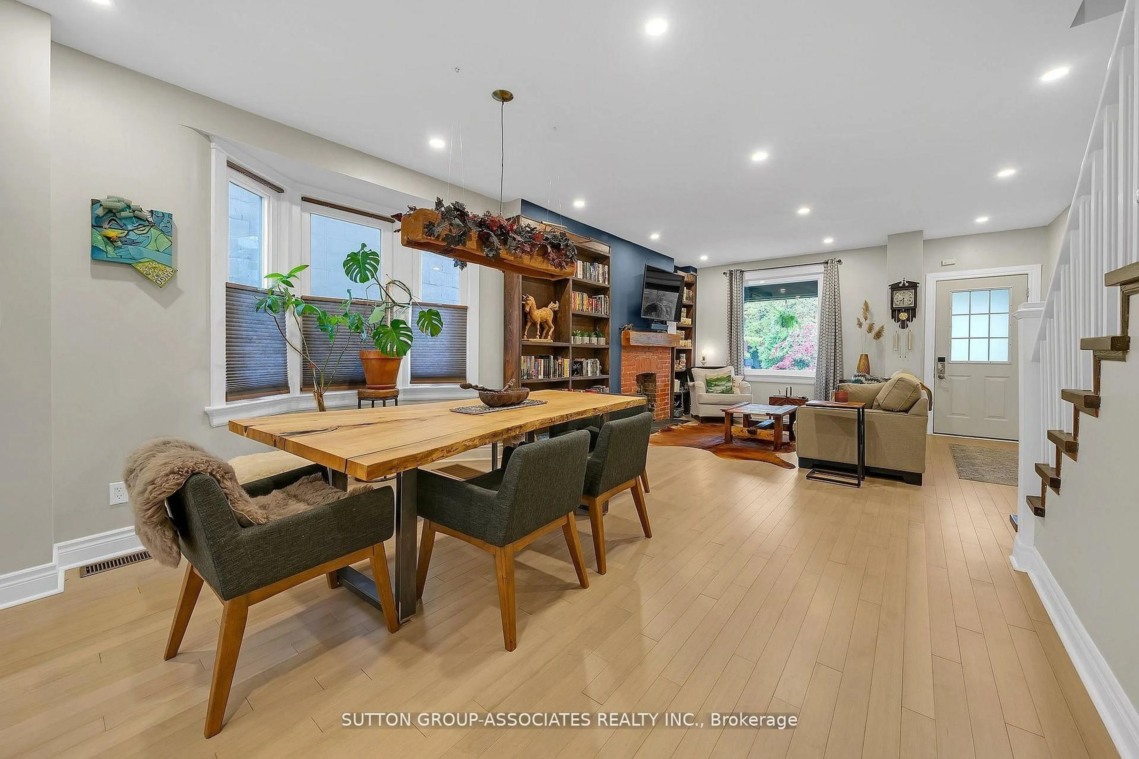 Open concept kitchen, wood/laminate floor for 69 Dagmar Ave, Toronto Ontario M4M 1V9