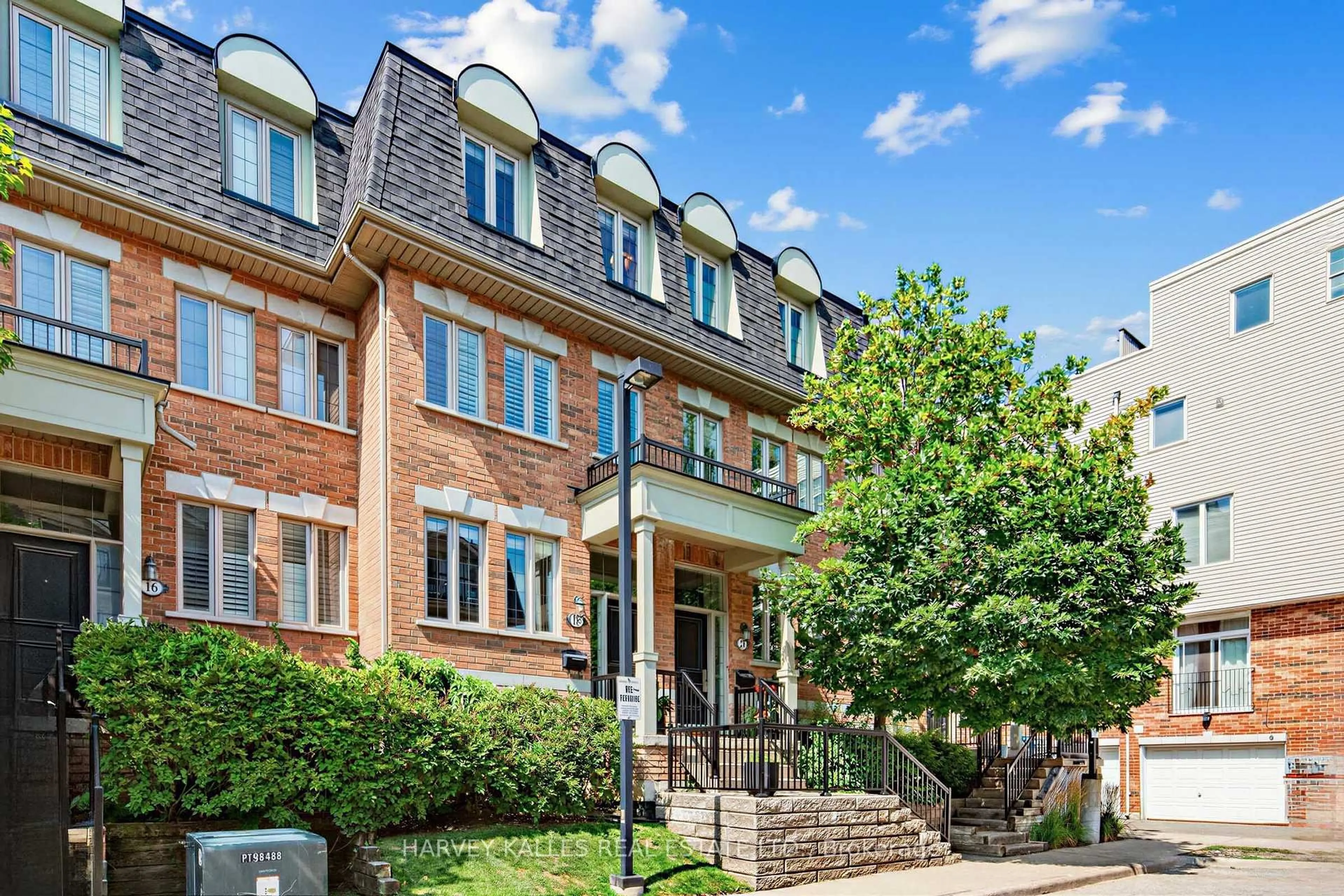 Home with brick exterior material, street for 18 Sargent Lane, Toronto Ontario M4E 3T9