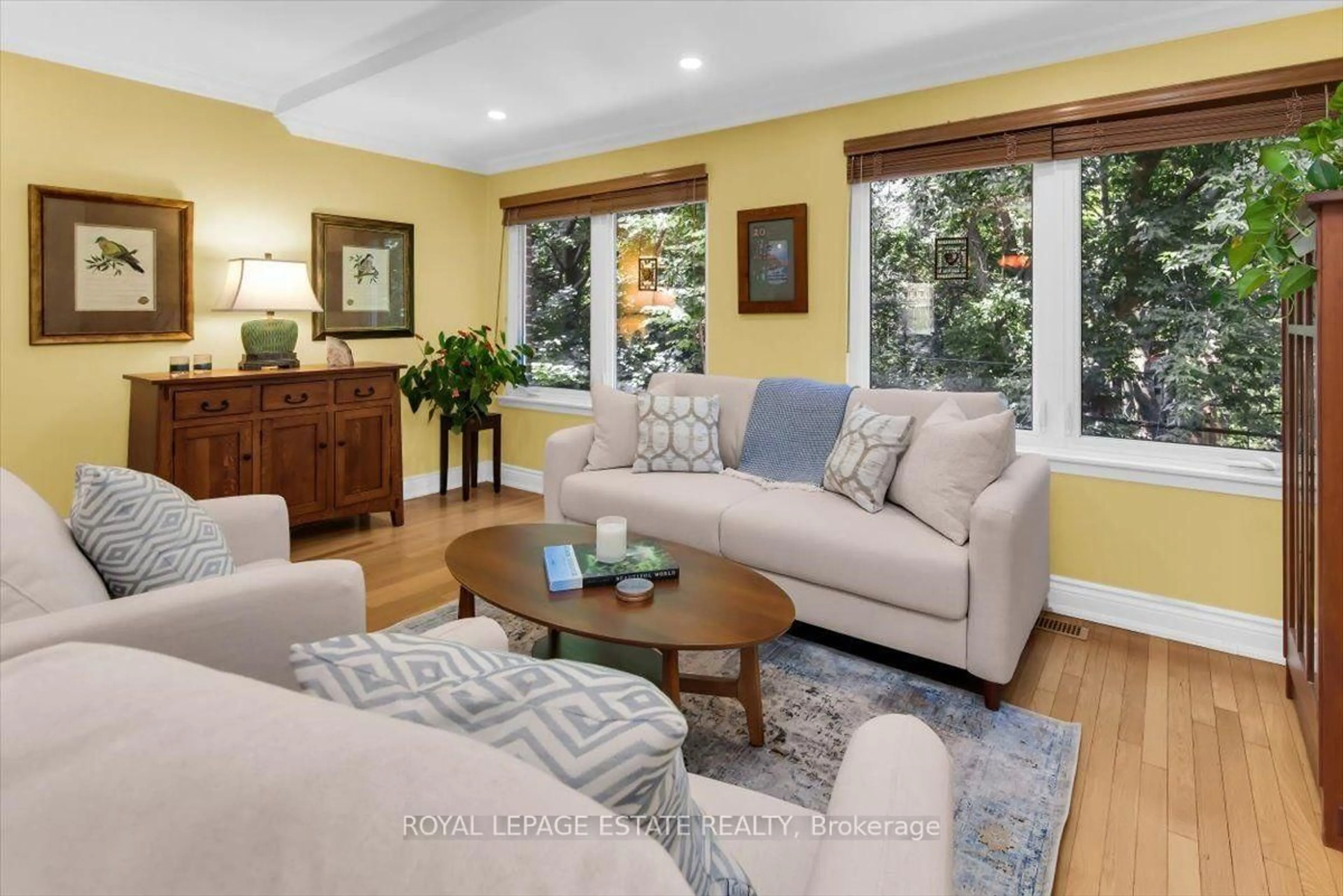 Living room with furniture, wood/laminate floor for 90 Edgewood Ave #123, Toronto Ontario M4L 3H1