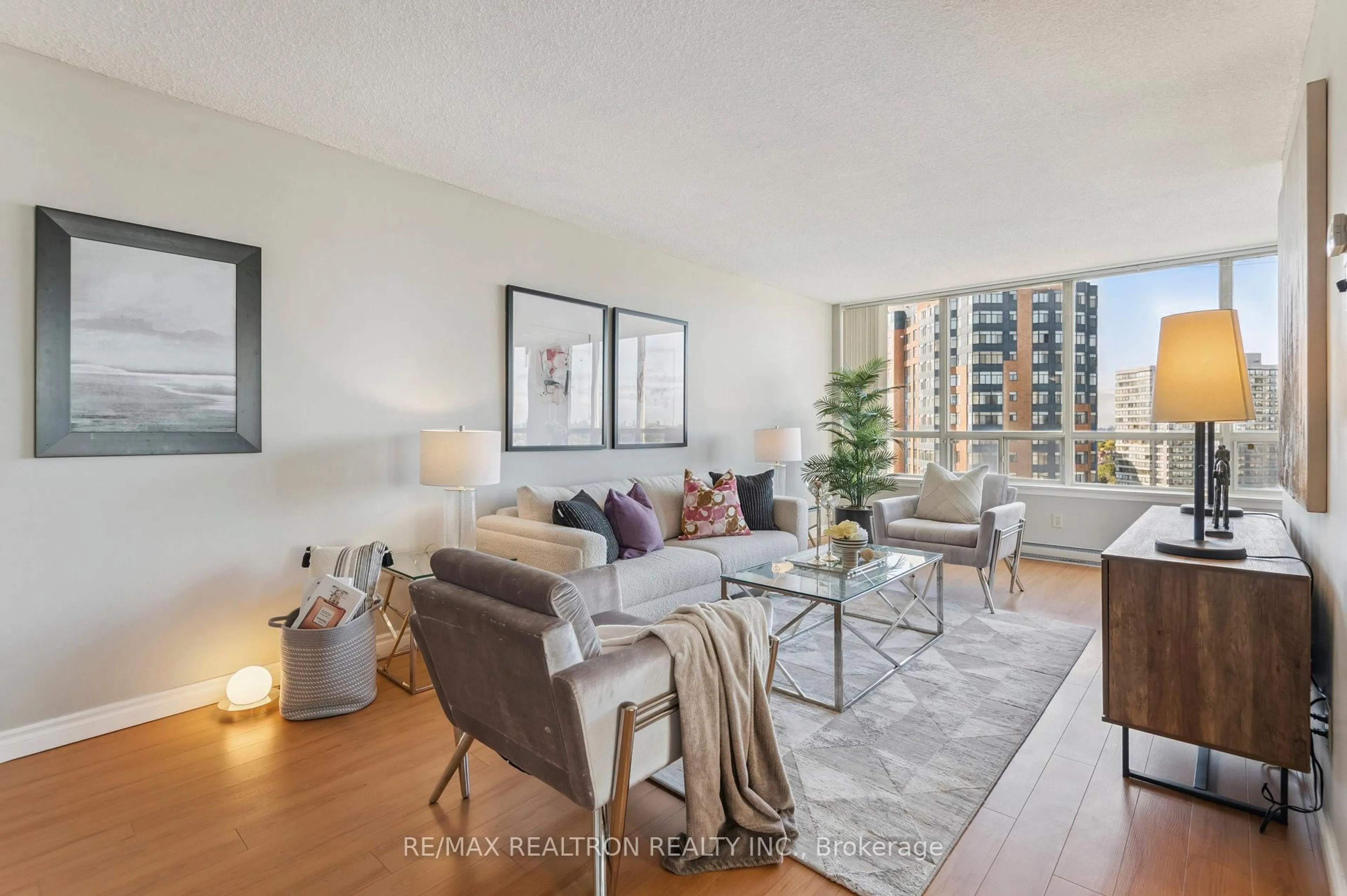 Living room with furniture, unknown for 150 Alton Towers Circ #1503, Toronto Ontario M1V 4X7