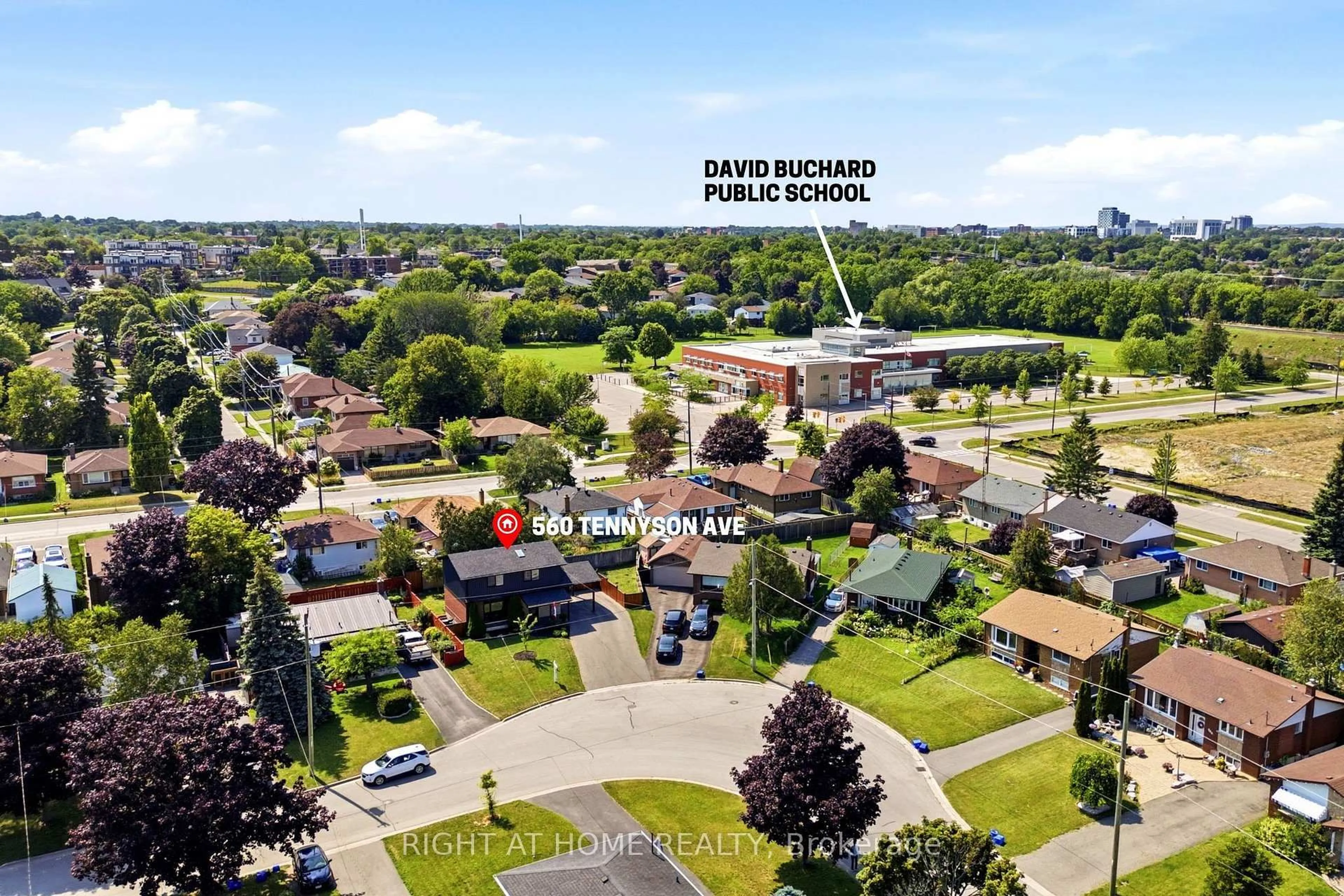 A pic from outside/outdoor area/front of a property/back of a property/a pic from drone, street for 560 Tennyson Ave, Oshawa Ontario L1H 3J8