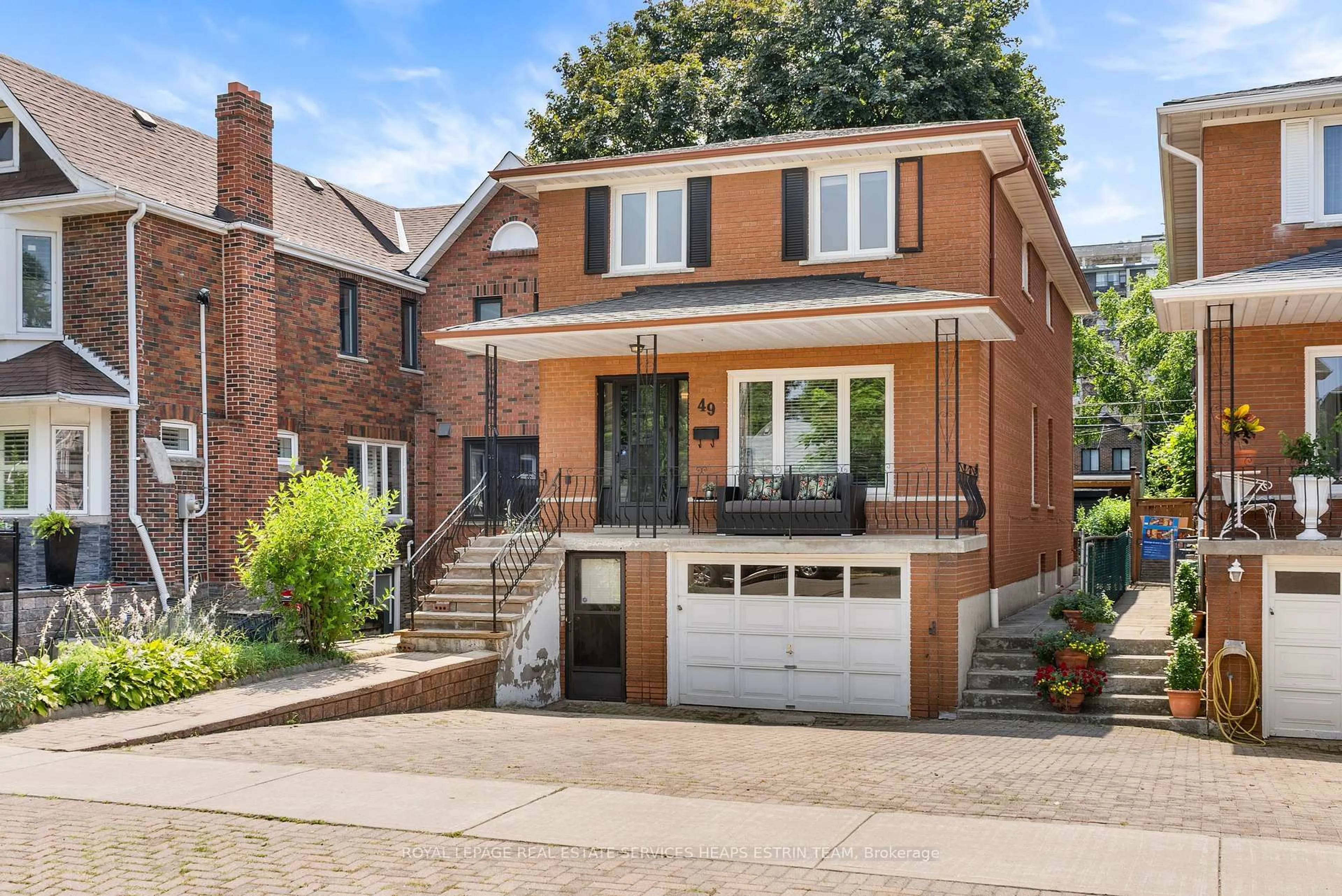 Home with brick exterior material, street for 49 Woodville Ave, Toronto Ontario M4K 2J5