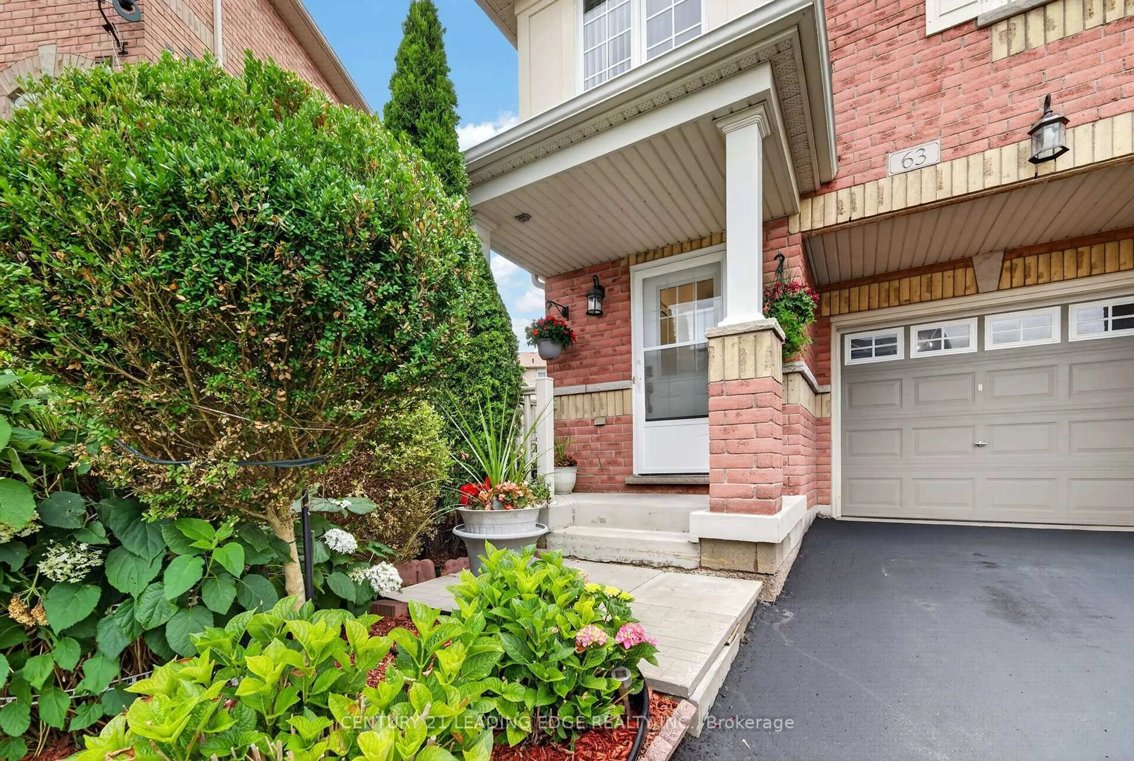 Home with brick exterior material, street for 63 Wilkes Cres, Toronto Ontario M1L 0B4