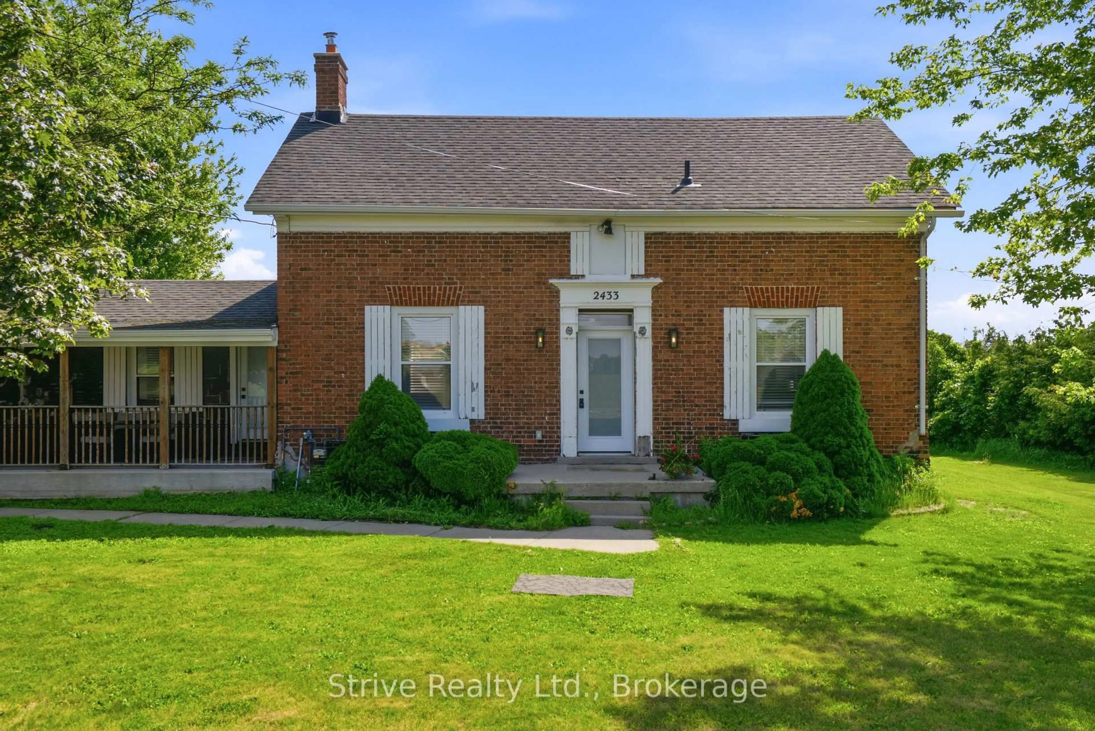 Home with brick exterior material, street for 2433 Courtice Rd, Clarington Ontario L1E 2M8