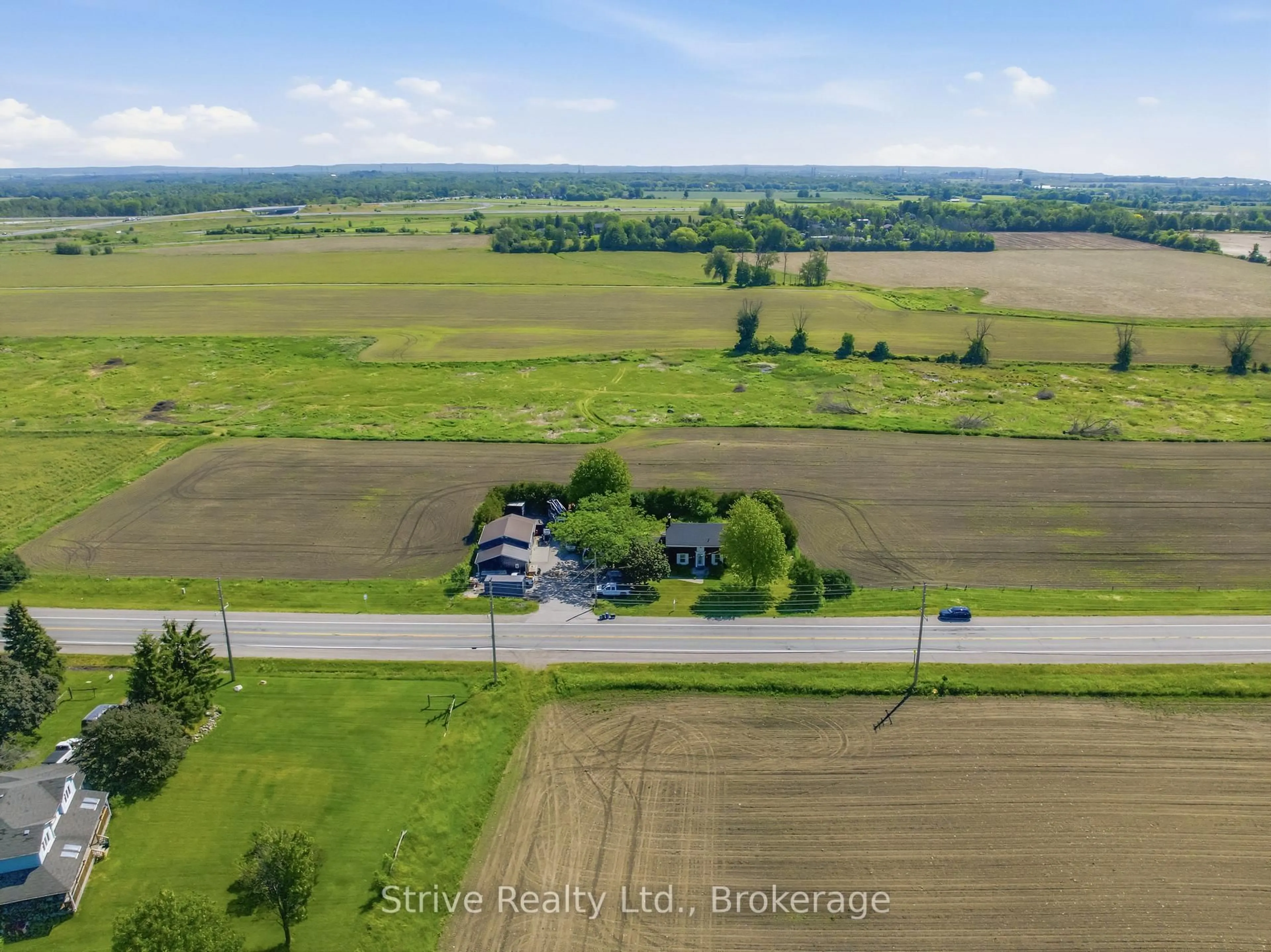 A pic from outside/outdoor area/front of a property/back of a property/a pic from drone, unknown for 2433 Courtice Rd, Clarington Ontario L1E 2M8