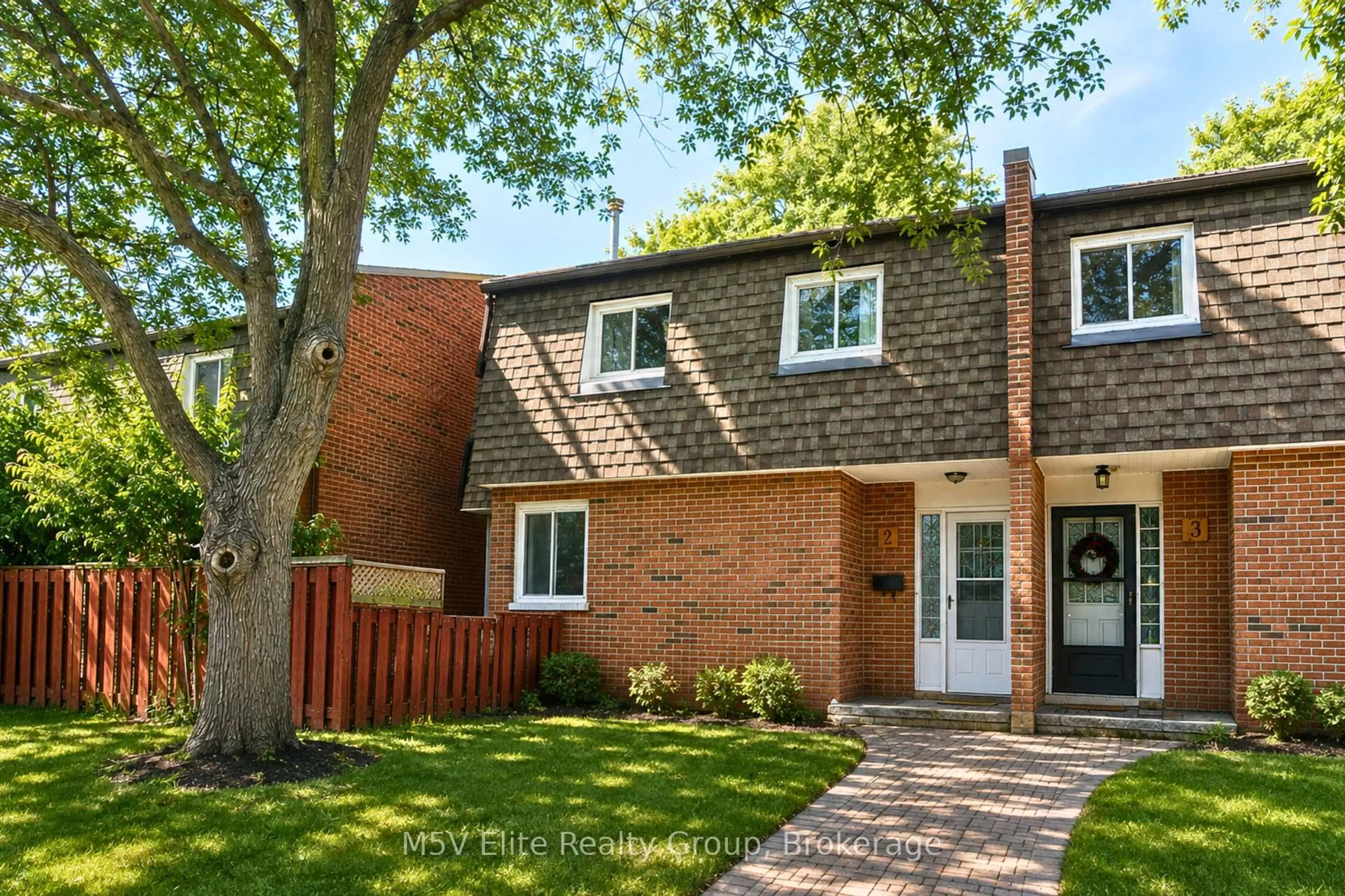 Home with brick exterior material, street for 105 Dovedale Dr #2, Whitby Ontario L1N 1Z7