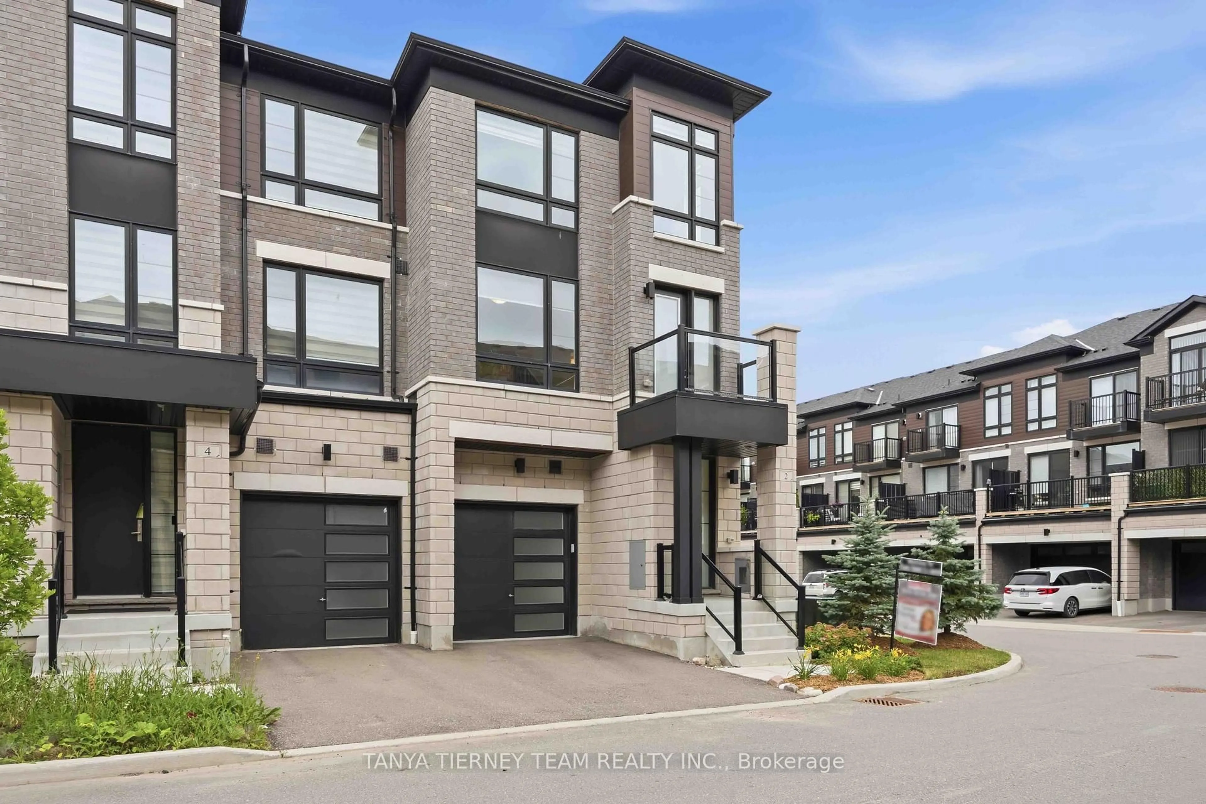 Home with brick exterior material, street for 2 Lake Trail Way, Whitby Ontario L1M 0E5