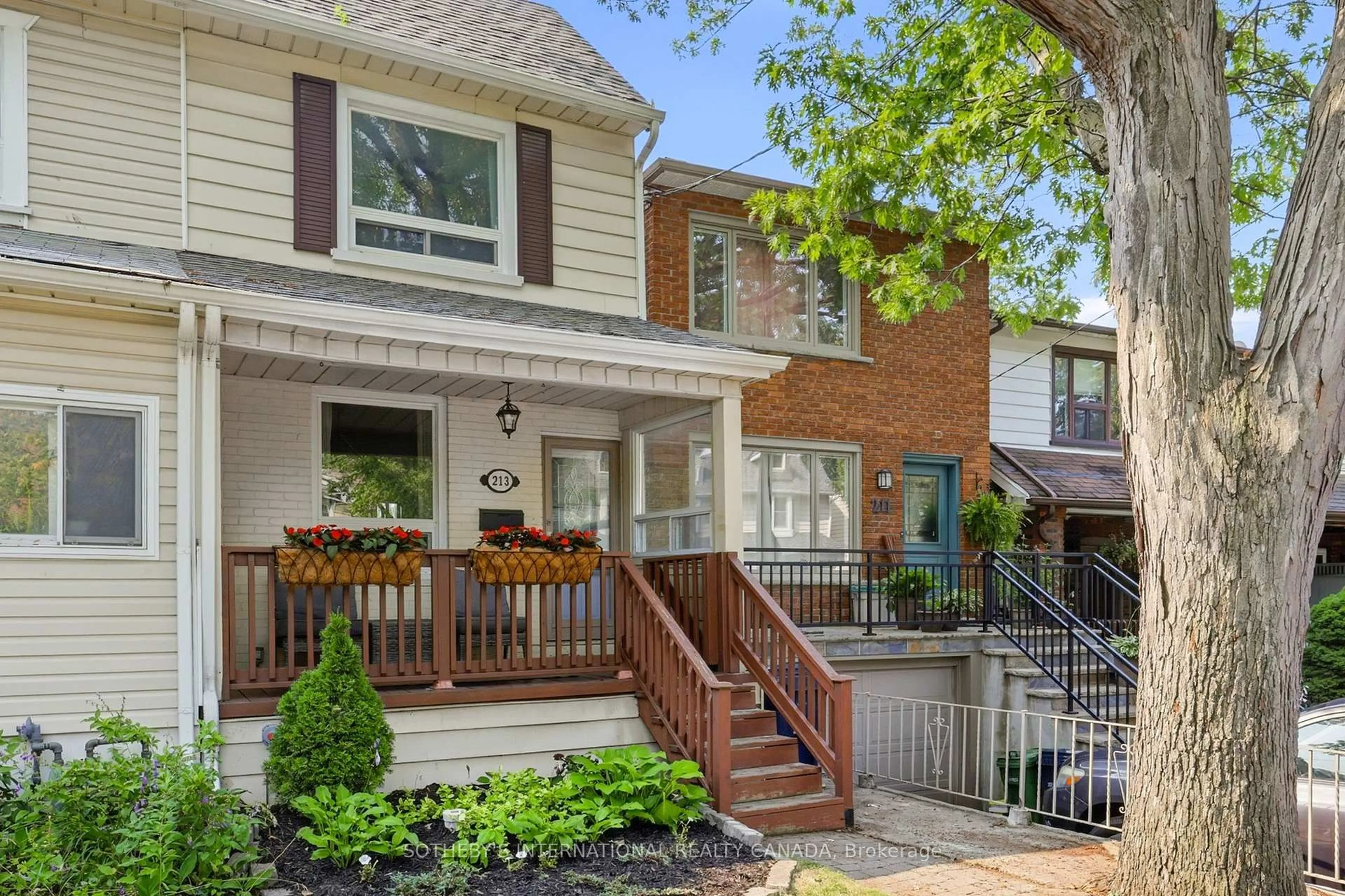 Home with brick exterior material, street for 213 Oakcrest Ave, Toronto Ontario M4C 1B8