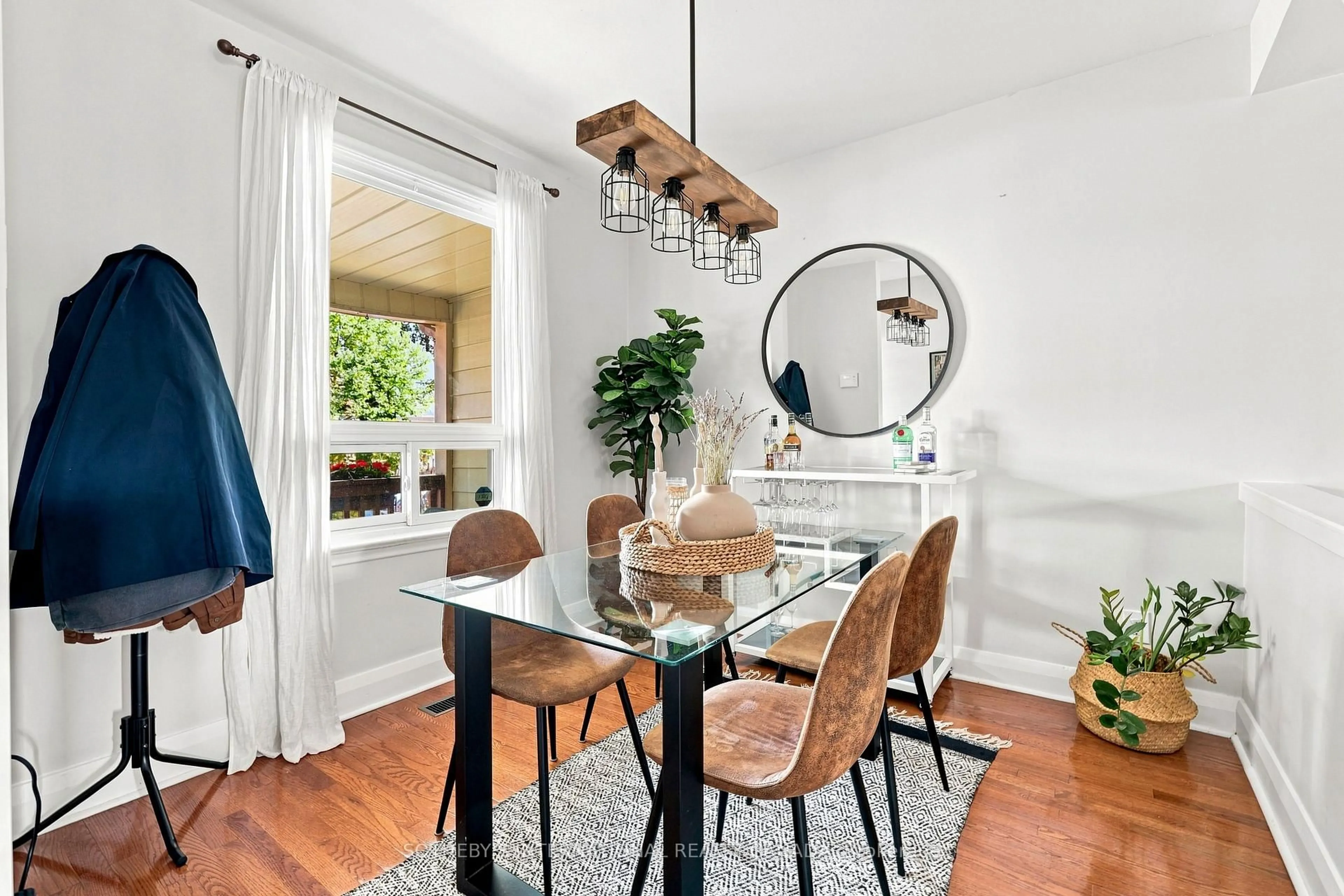 Dining room, wood/laminate floor for 213 Oakcrest Ave, Toronto Ontario M4C 1B8
