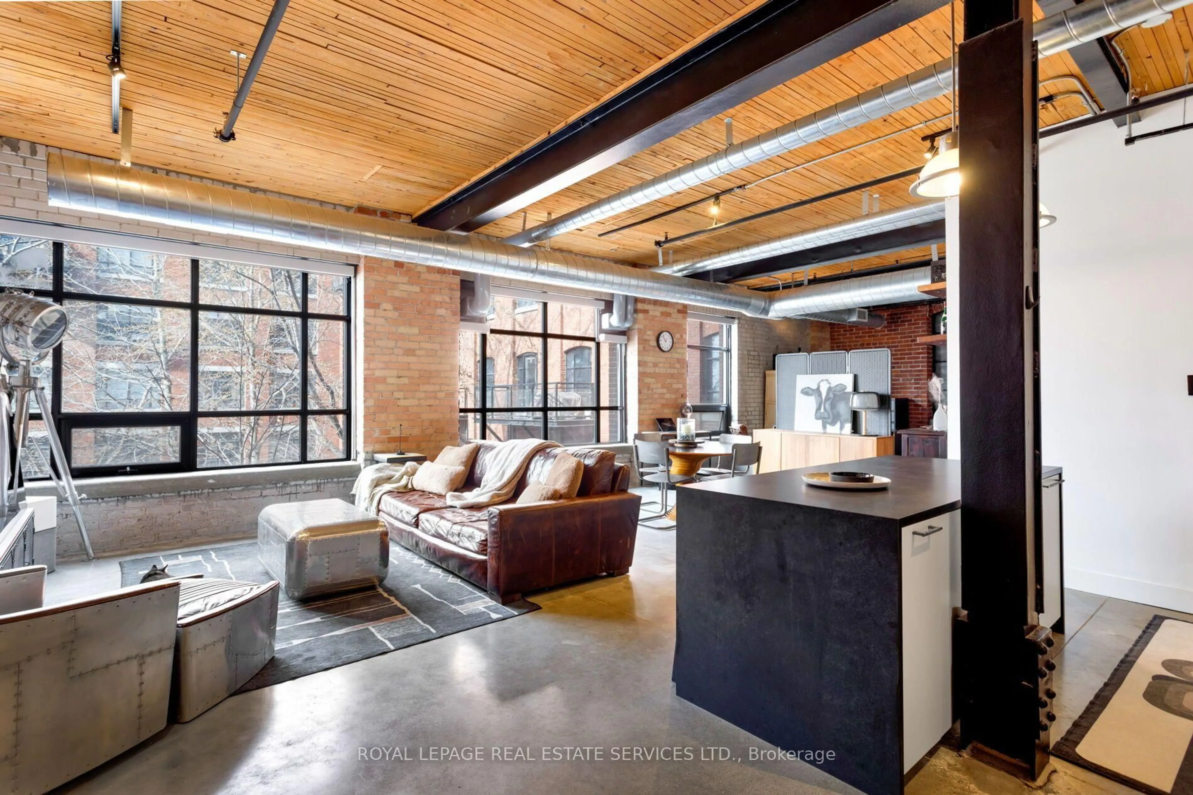 Open concept kitchen, cement floor for 68 Broadview Ave #326, Toronto Ontario M4M 2E6