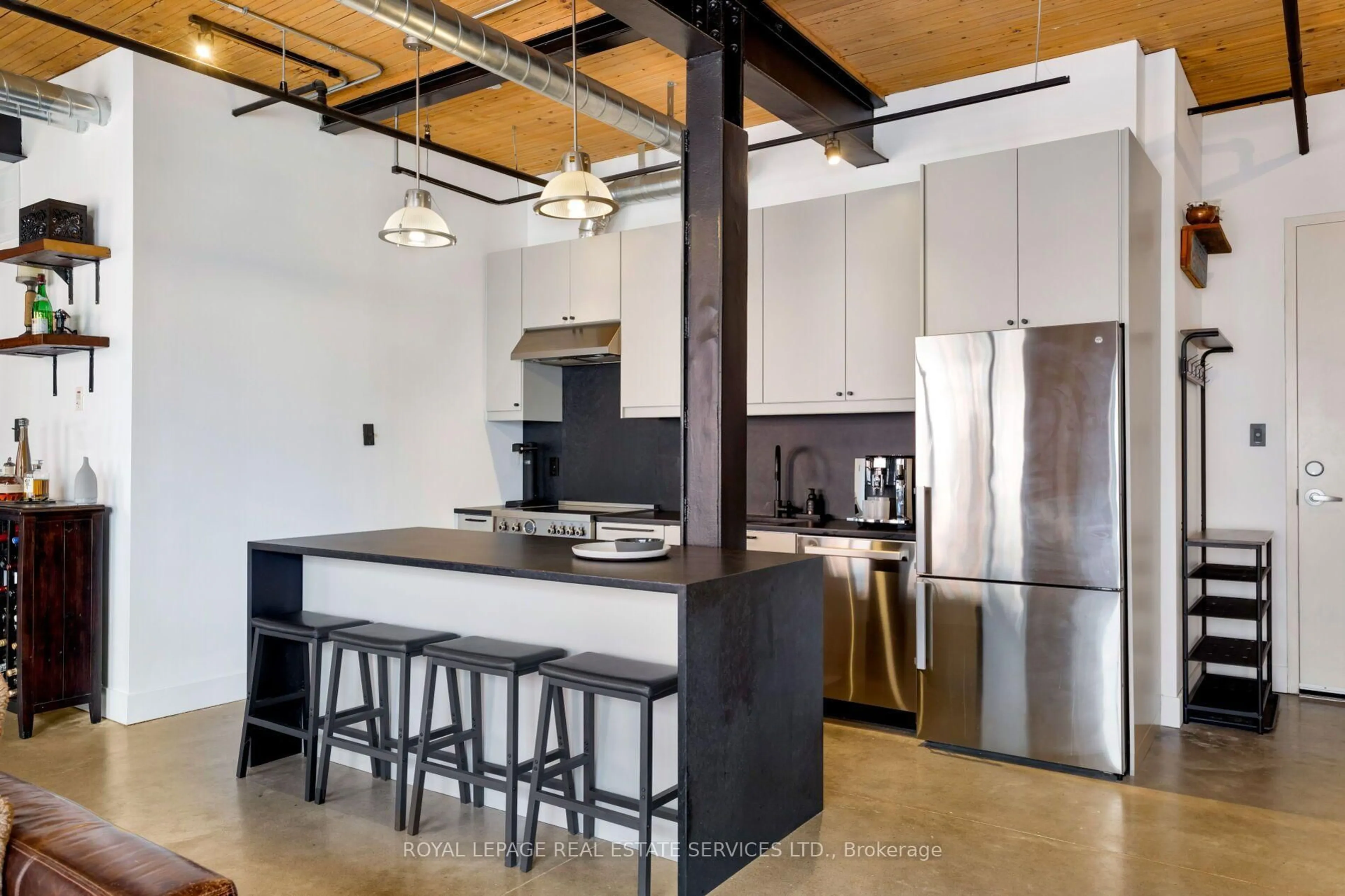 Open concept kitchen, cement floor for 68 Broadview Ave #326, Toronto Ontario M4M 2E6