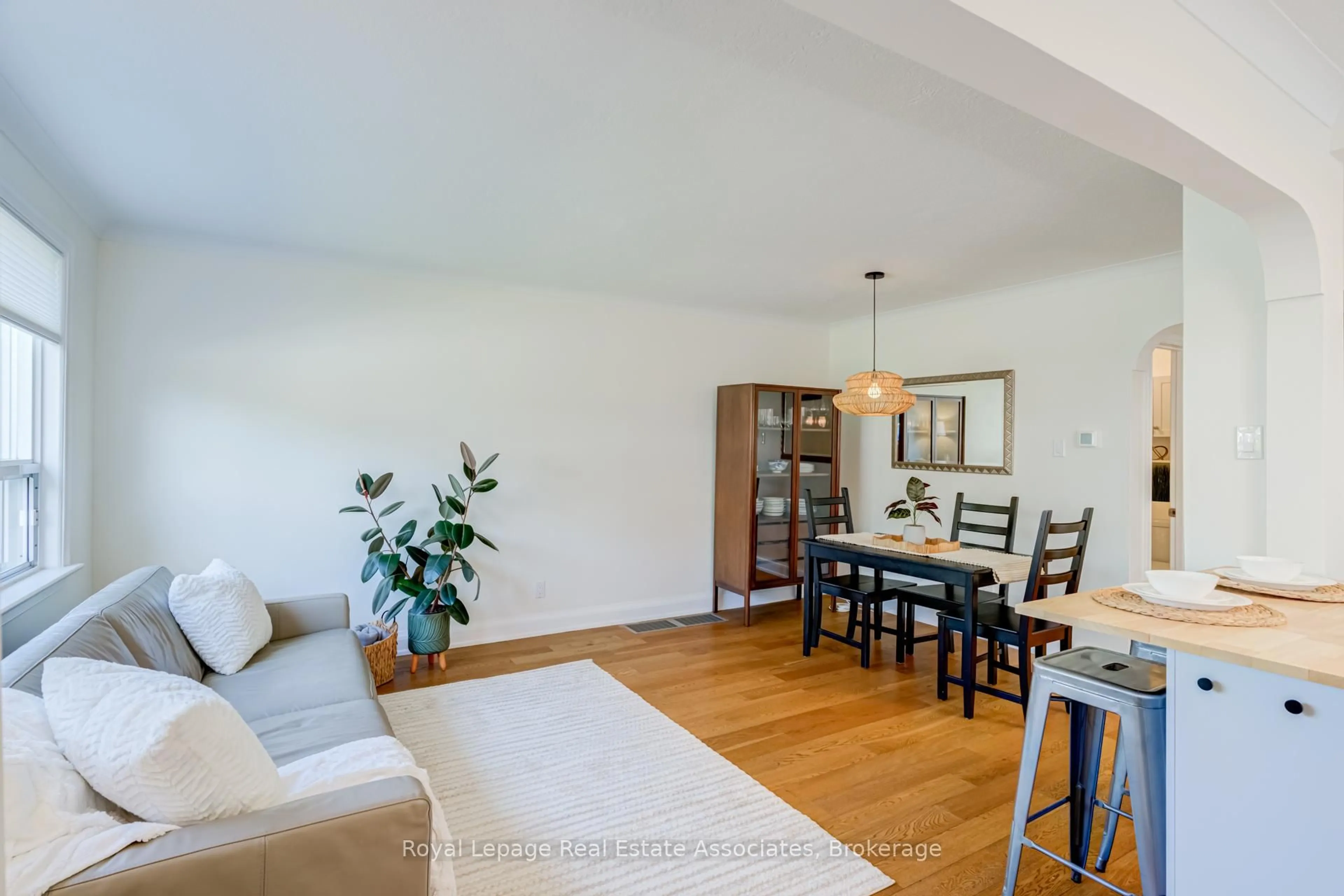 Living room with furniture, wood/laminate floor for 43 Heale Ave, Toronto Ontario M1N 3X6