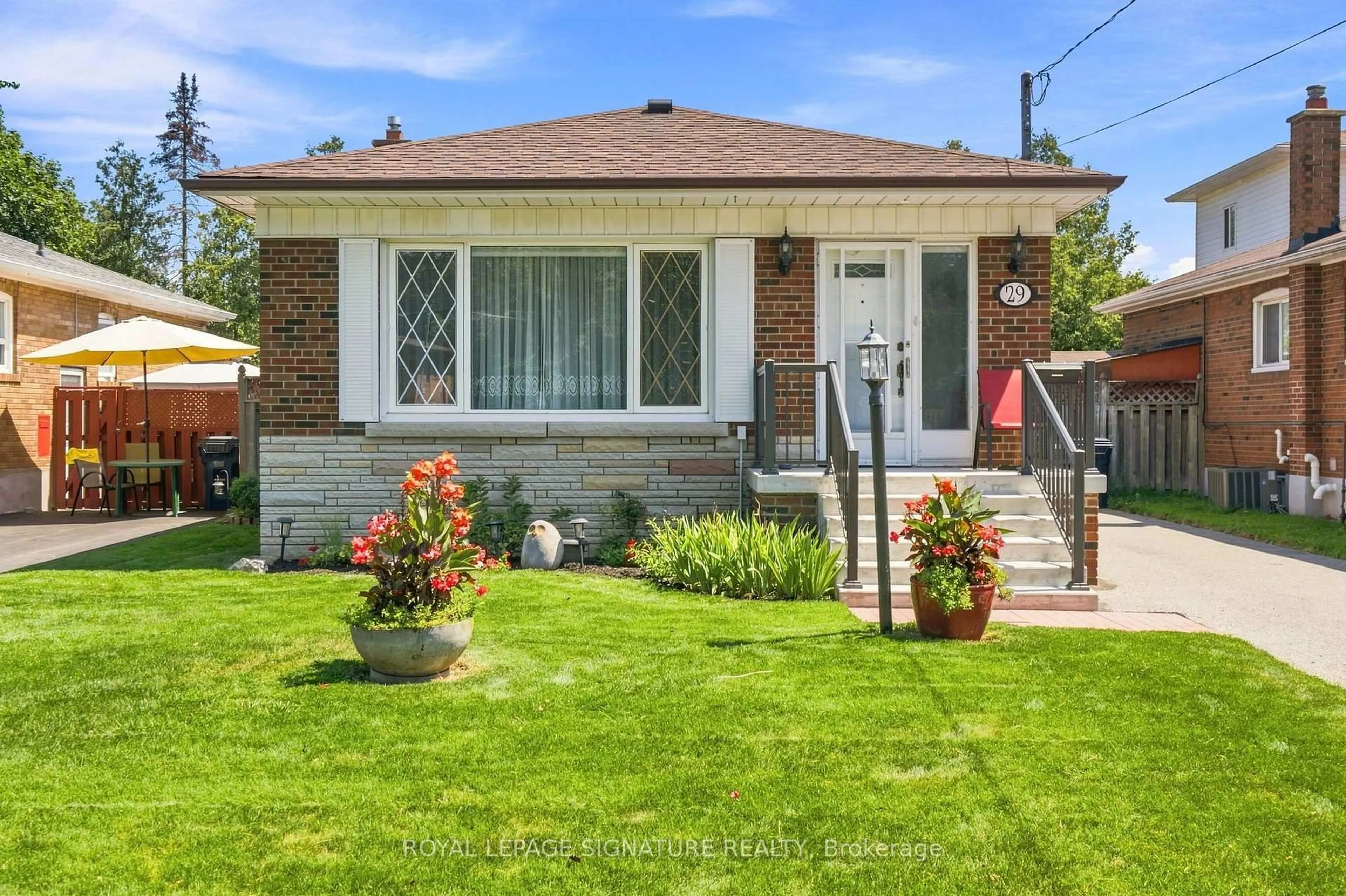 Home with brick exterior material, street for 29 Chandler Dr, Toronto Ontario M1G 1Z1