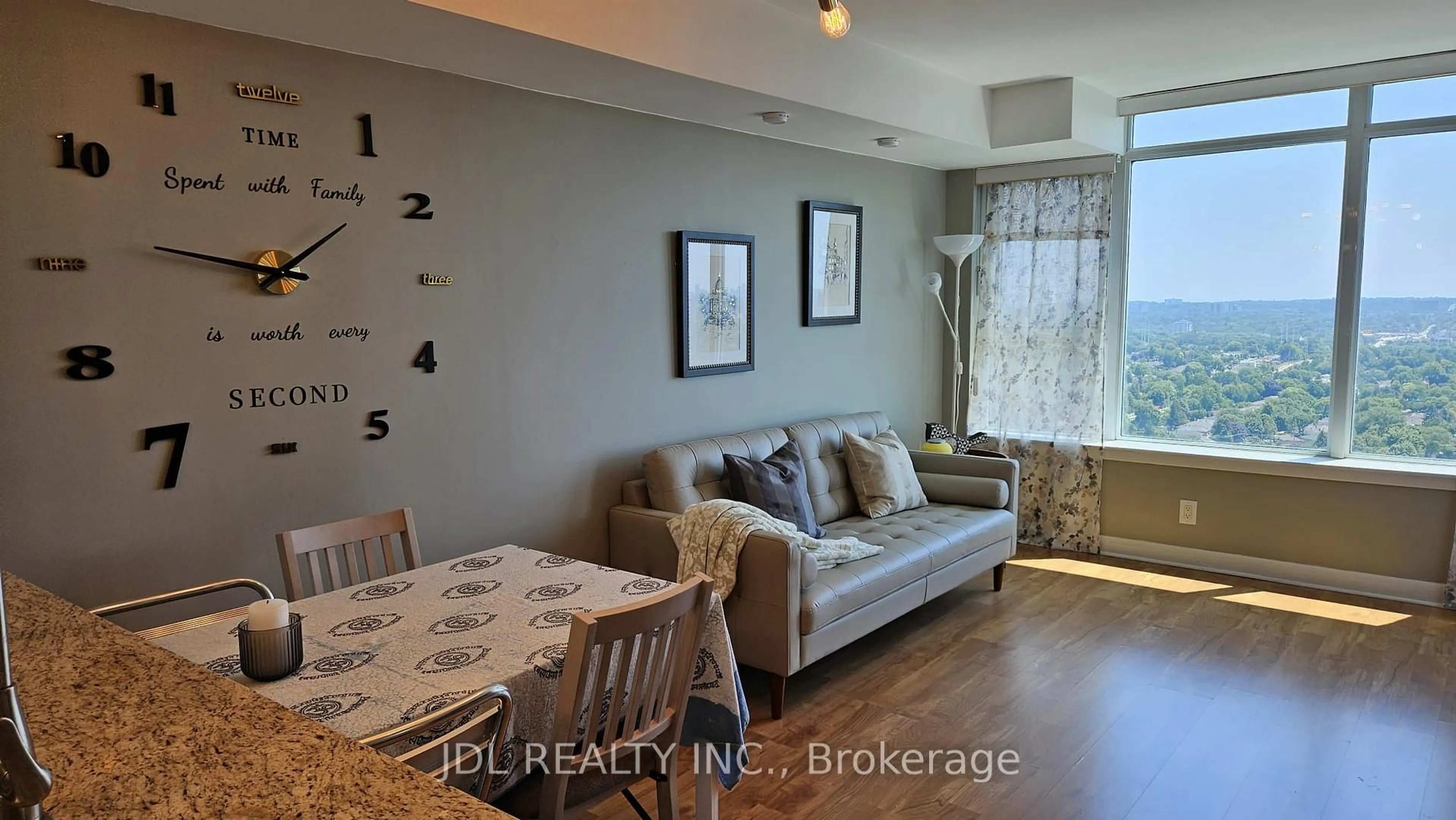 Living room with furniture, wood/laminate floor for 190 Borough Dr, Toronto Ontario M1P 0B6