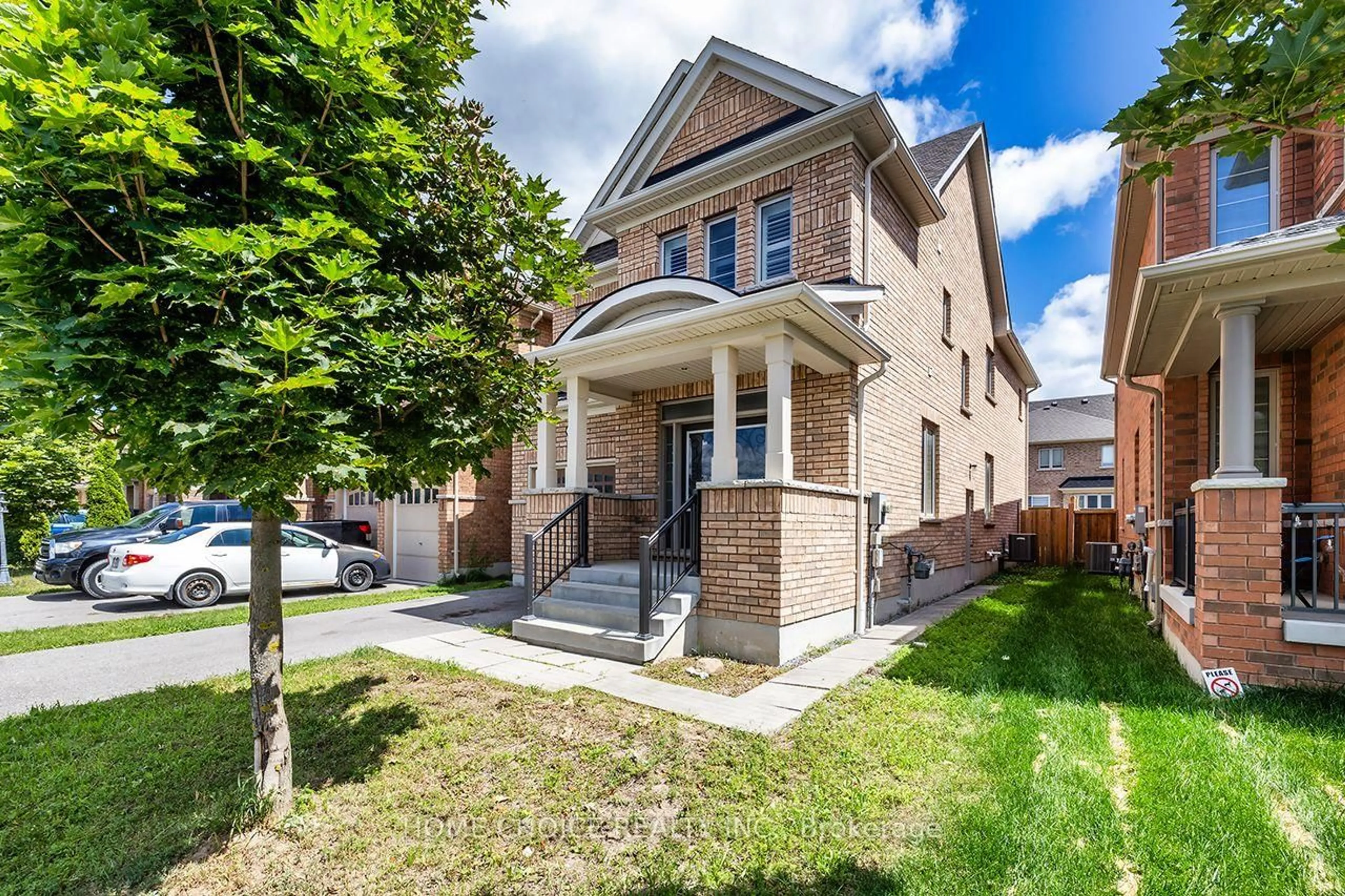 Home with brick exterior material, street for 427 WINDSFIELDS FARM Dr, Oshawa Ontario L1L 0M1