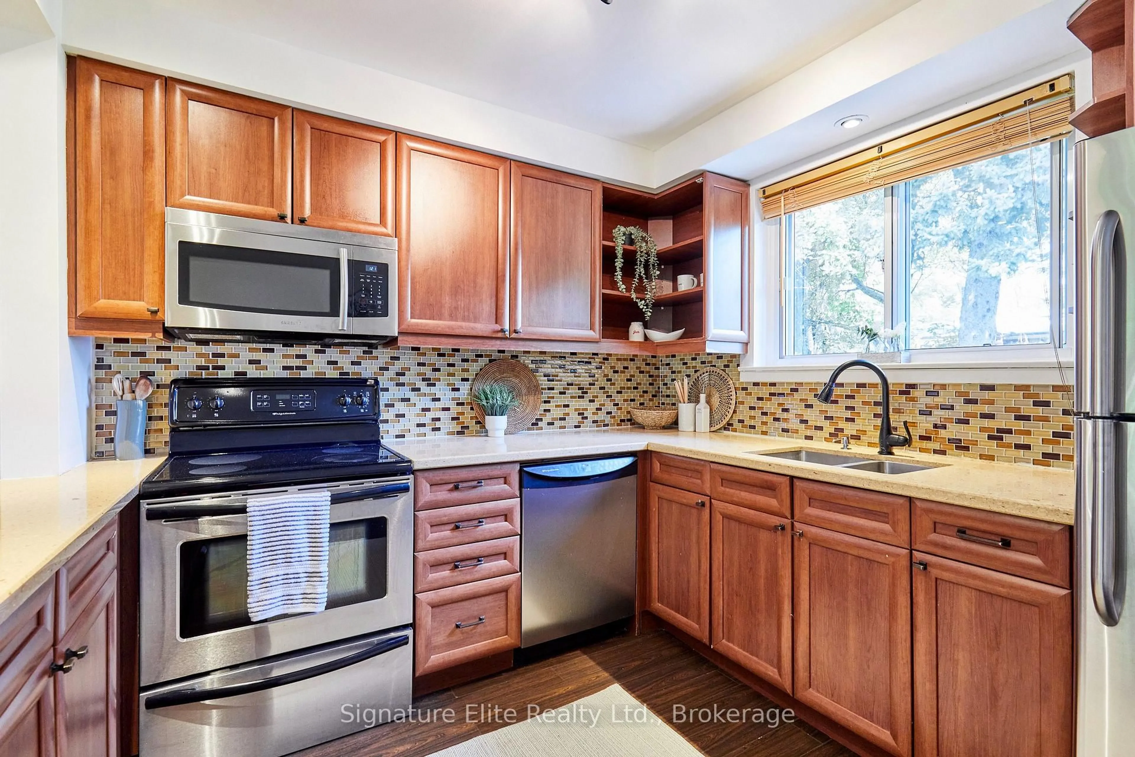 Standard kitchen, ceramic/tile floor for 65 Merkley Sq, Toronto Ontario M1G 2Y5