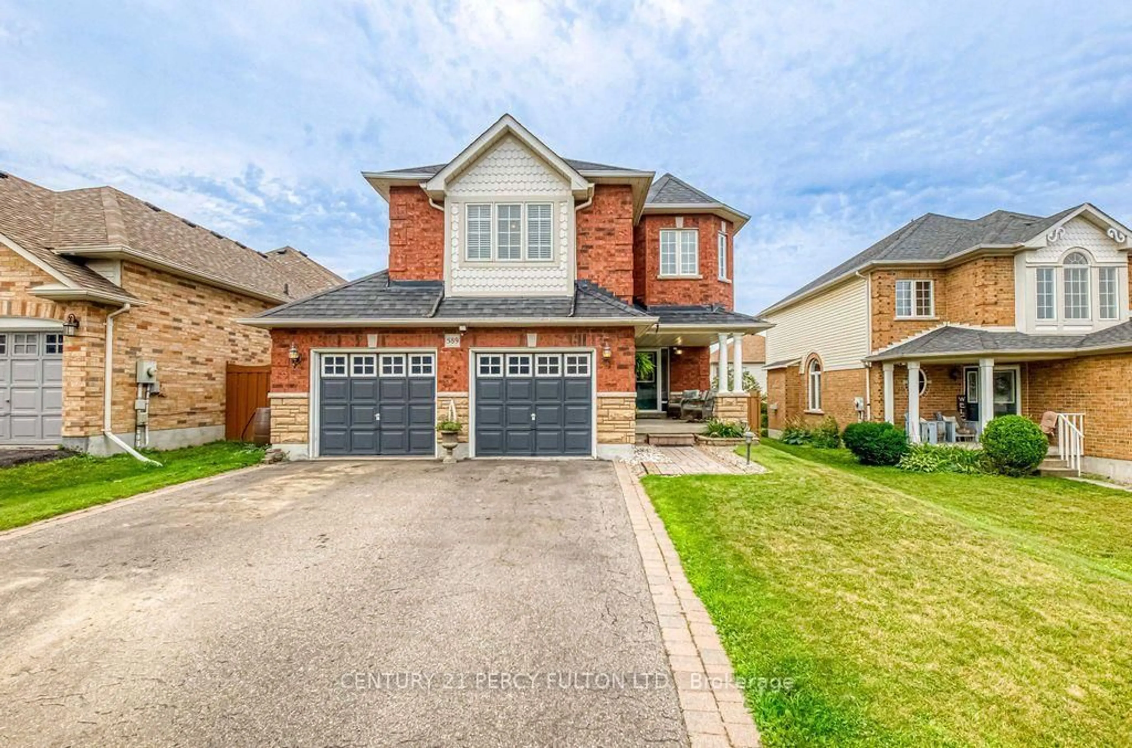 Home with brick exterior material, street for 589 Blackwood Blvd, Oshawa Ontario L1K 2N4
