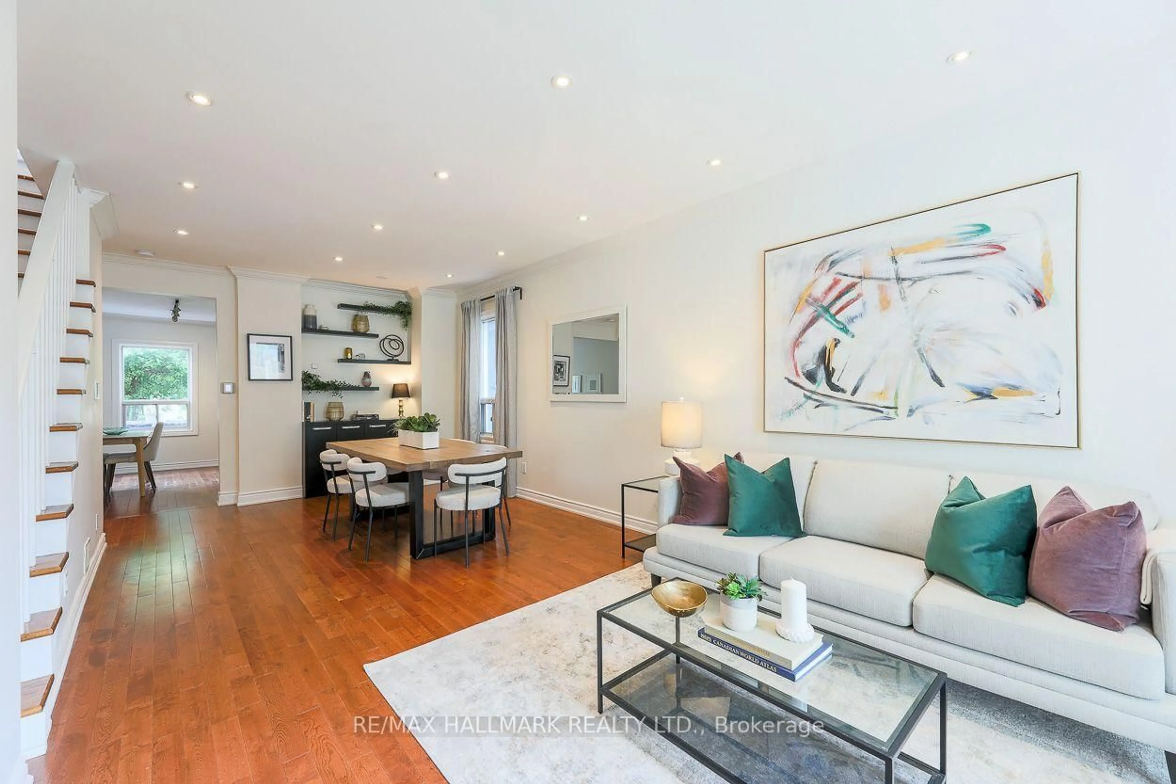 Living room with furniture, wood/laminate floor for 38 Boultbee Ave, Toronto Ontario M4J 1A8