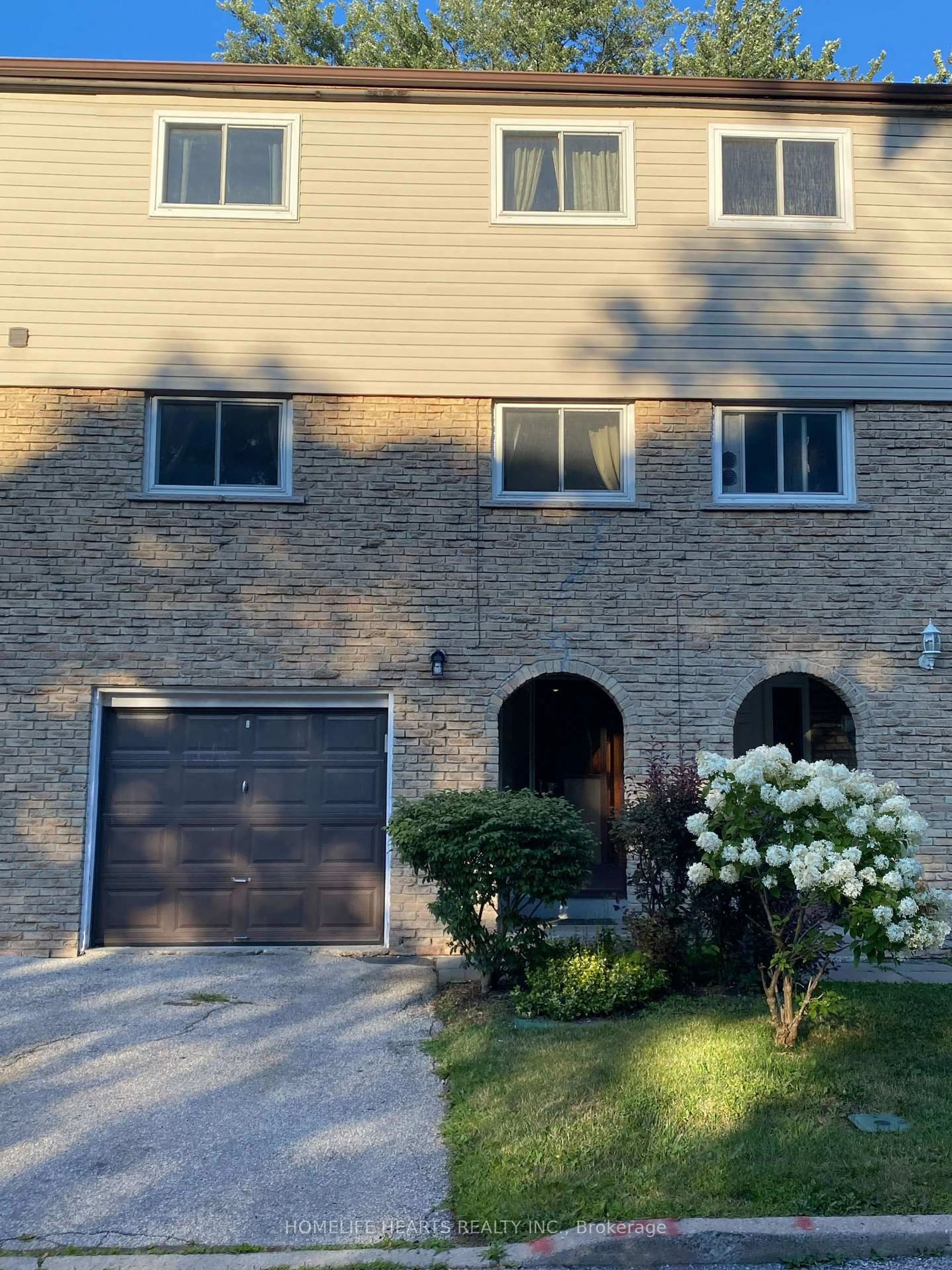 Home with brick exterior material, street for 21 Rockwood Dr #22, Toronto Ontario M1M 3M9