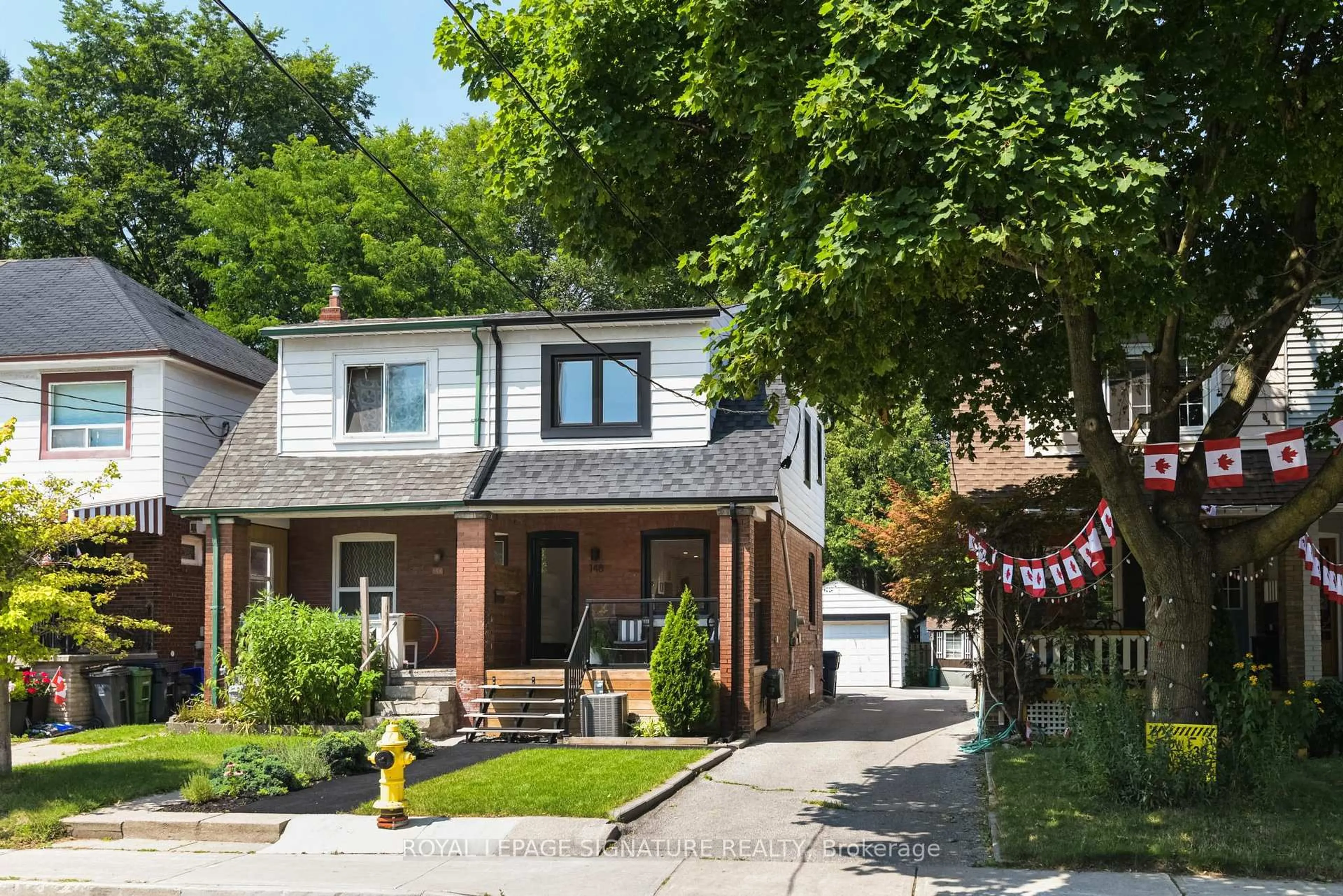 Home with brick exterior material, street for 148 Mortimer Ave, Toronto Ontario M4K 2A4