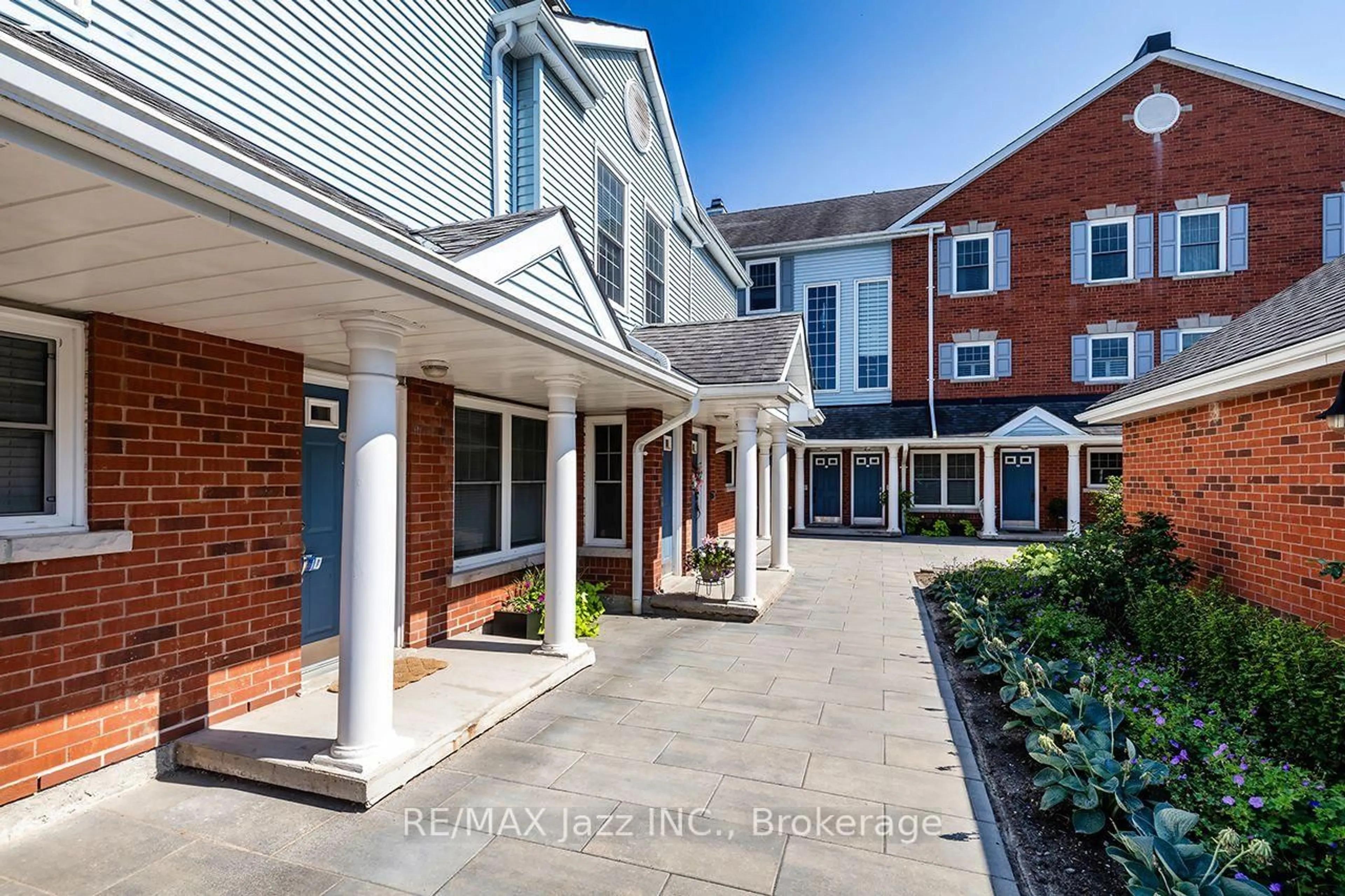 A pic from outside/outdoor area/front of a property/back of a property/a pic from drone, street for 1669 Nash Rd #G4, Clarington Ontario L1E 1S8