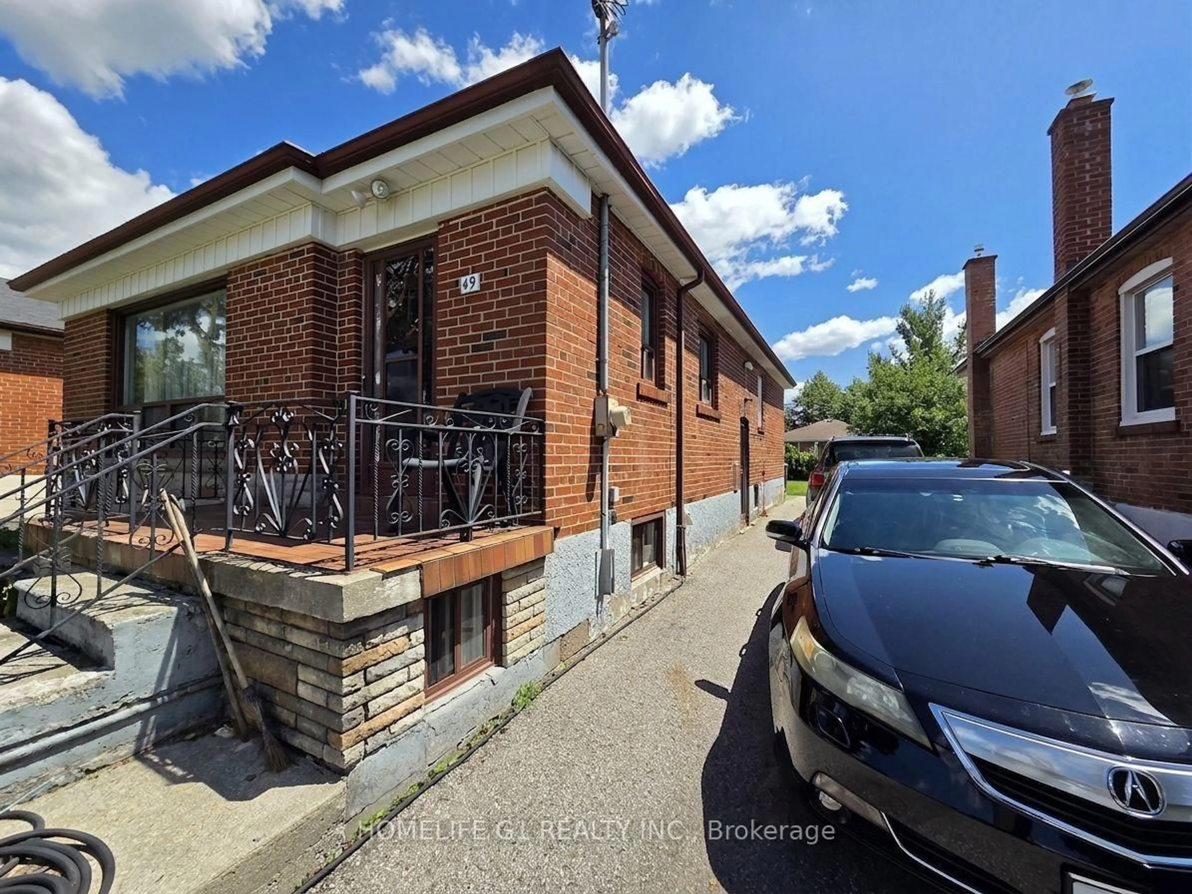 Home with brick exterior material, street for 49 Kilgreggan Cres, Toronto Ontario M1J 1S4